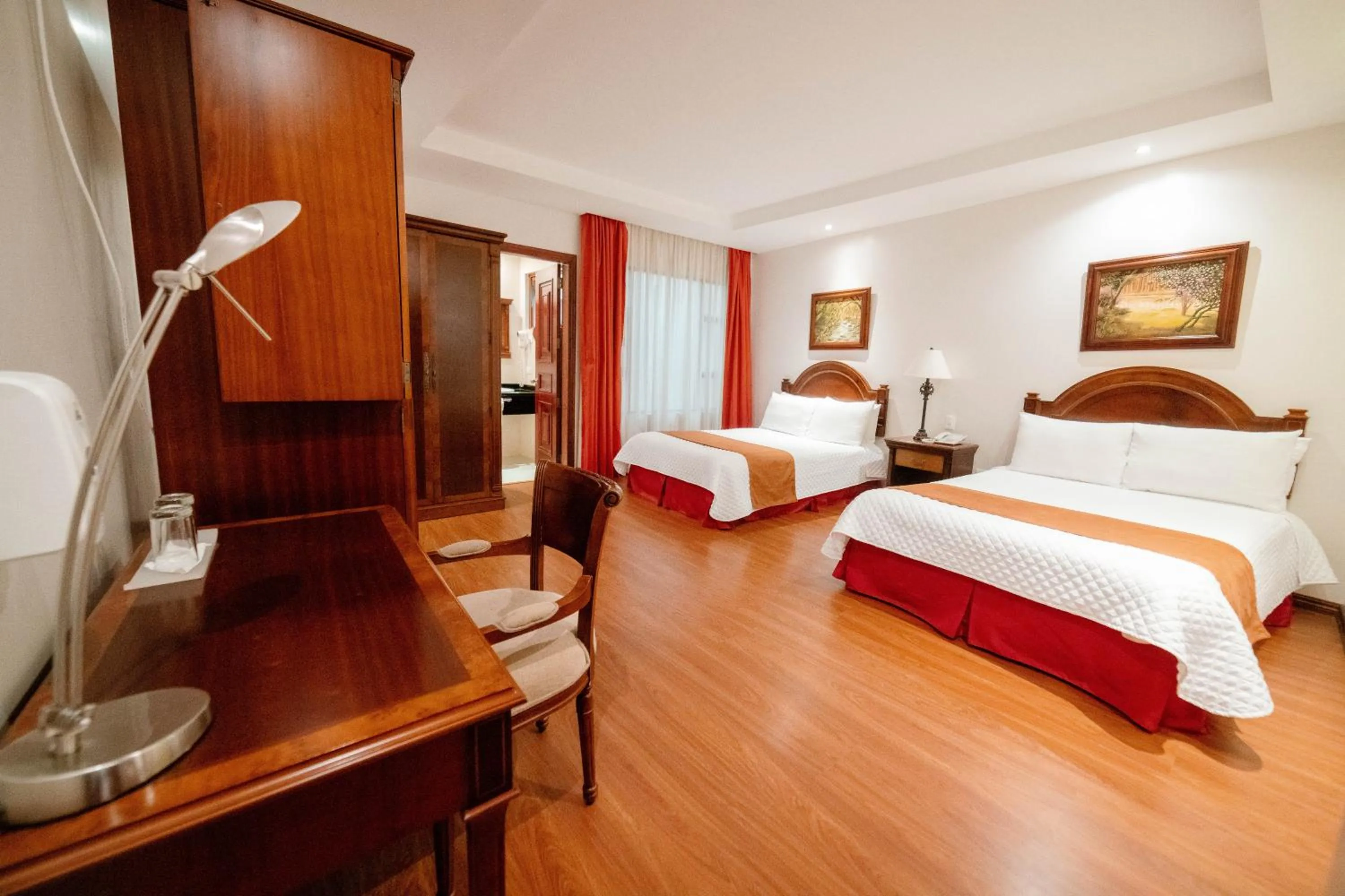 Bed in Grand Victoria Boutique Hotel