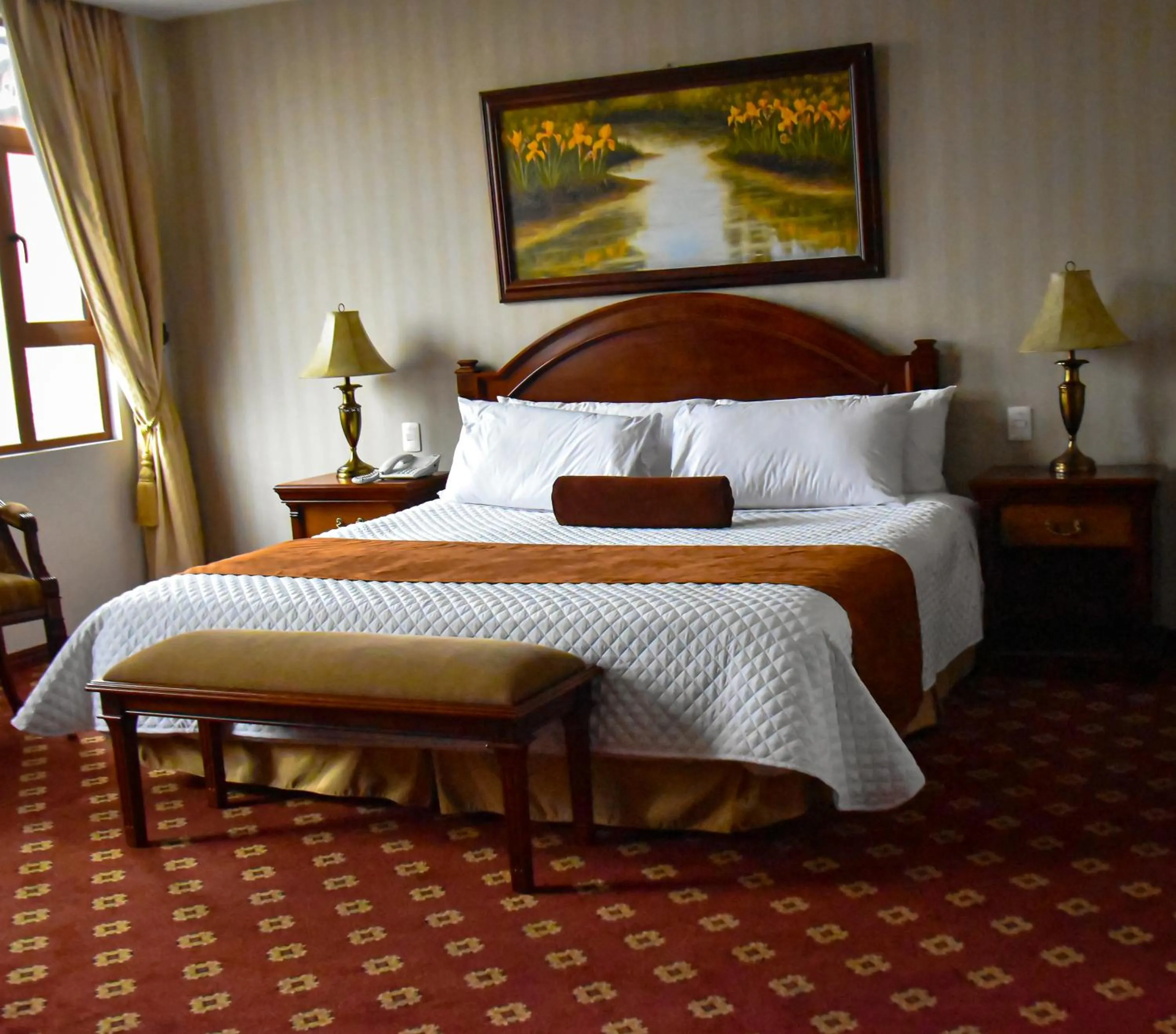 Bed in Grand Victoria Boutique Hotel
