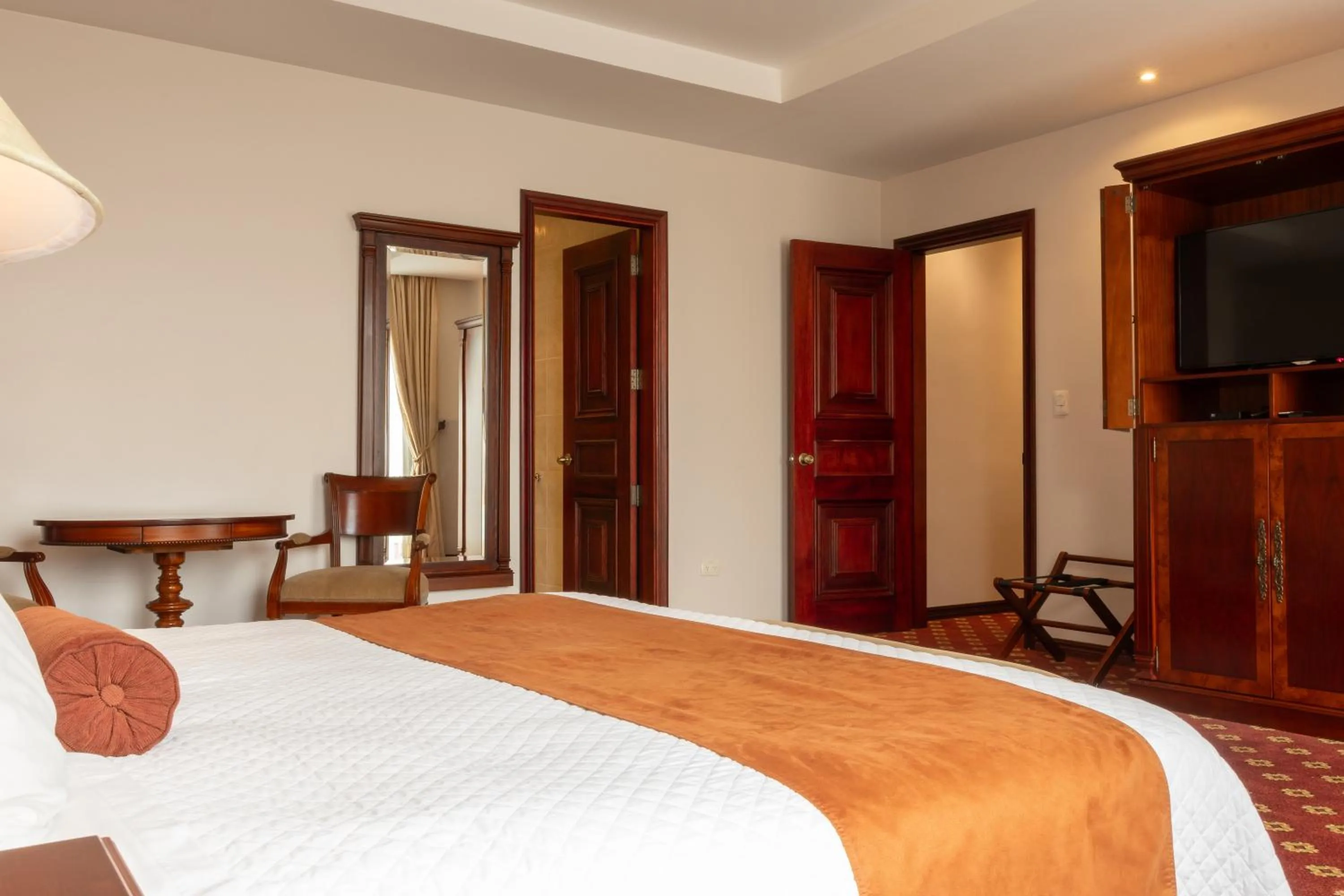 Bed in Grand Victoria Boutique Hotel