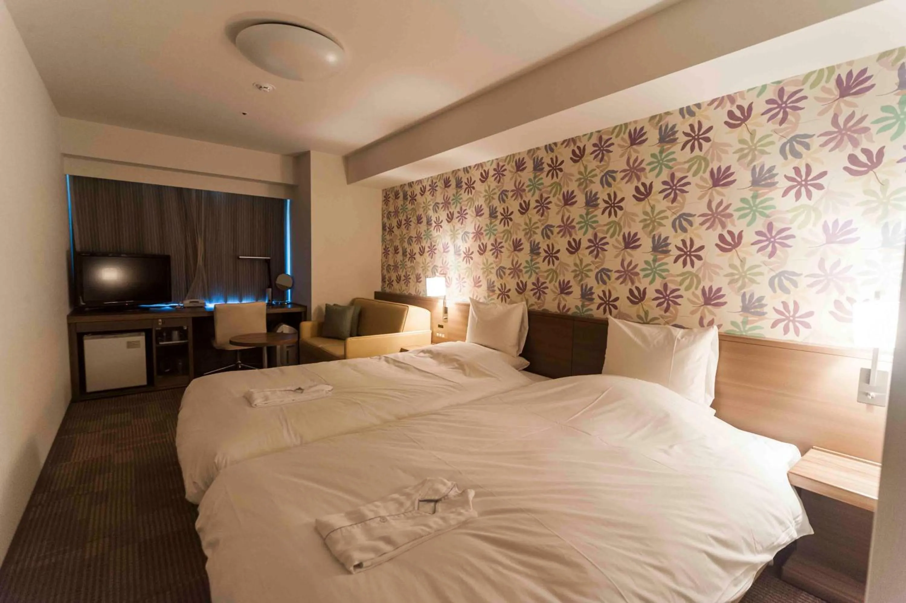 Photo of the whole room, Bed in Daiwa Roynet Hotel Okinawa-Kenchomae