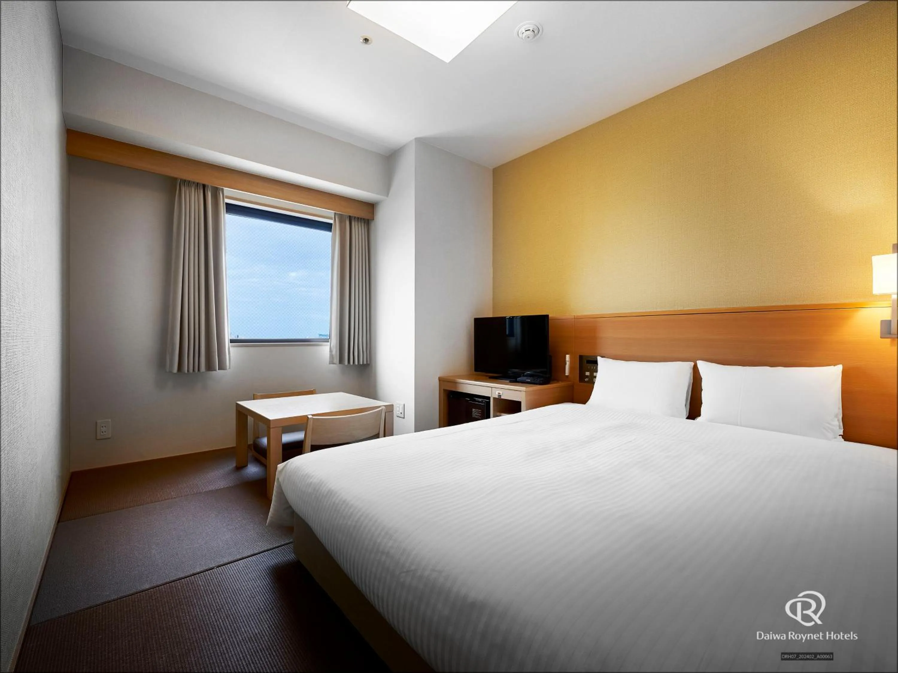 Photo of the whole room, Bed in Daiwa Roynet Hotel Okinawa-Kenchomae