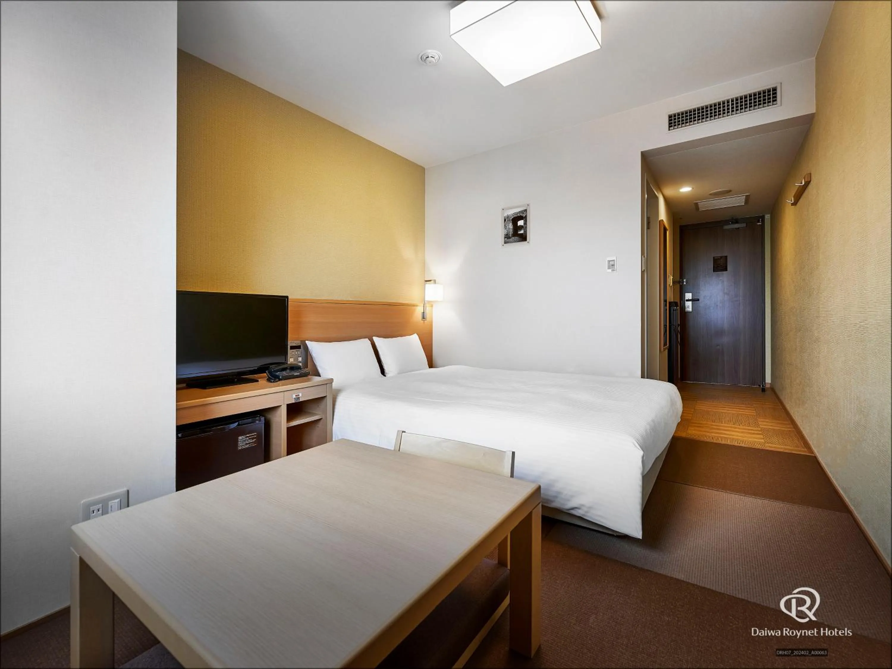 Photo of the whole room, Bed in Daiwa Roynet Hotel Okinawa-Kenchomae