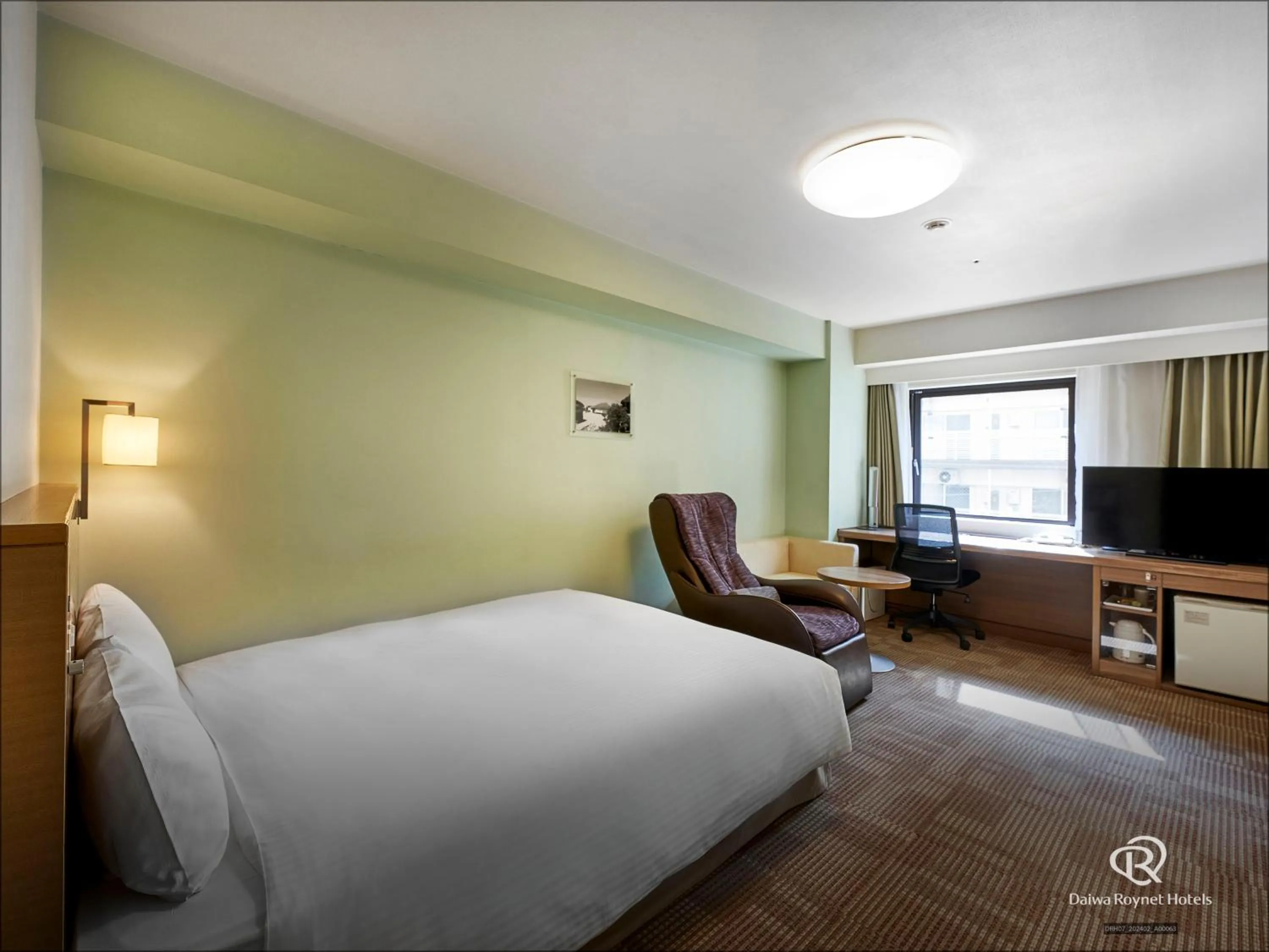 Photo of the whole room, Bed in Daiwa Roynet Hotel Okinawa-Kenchomae