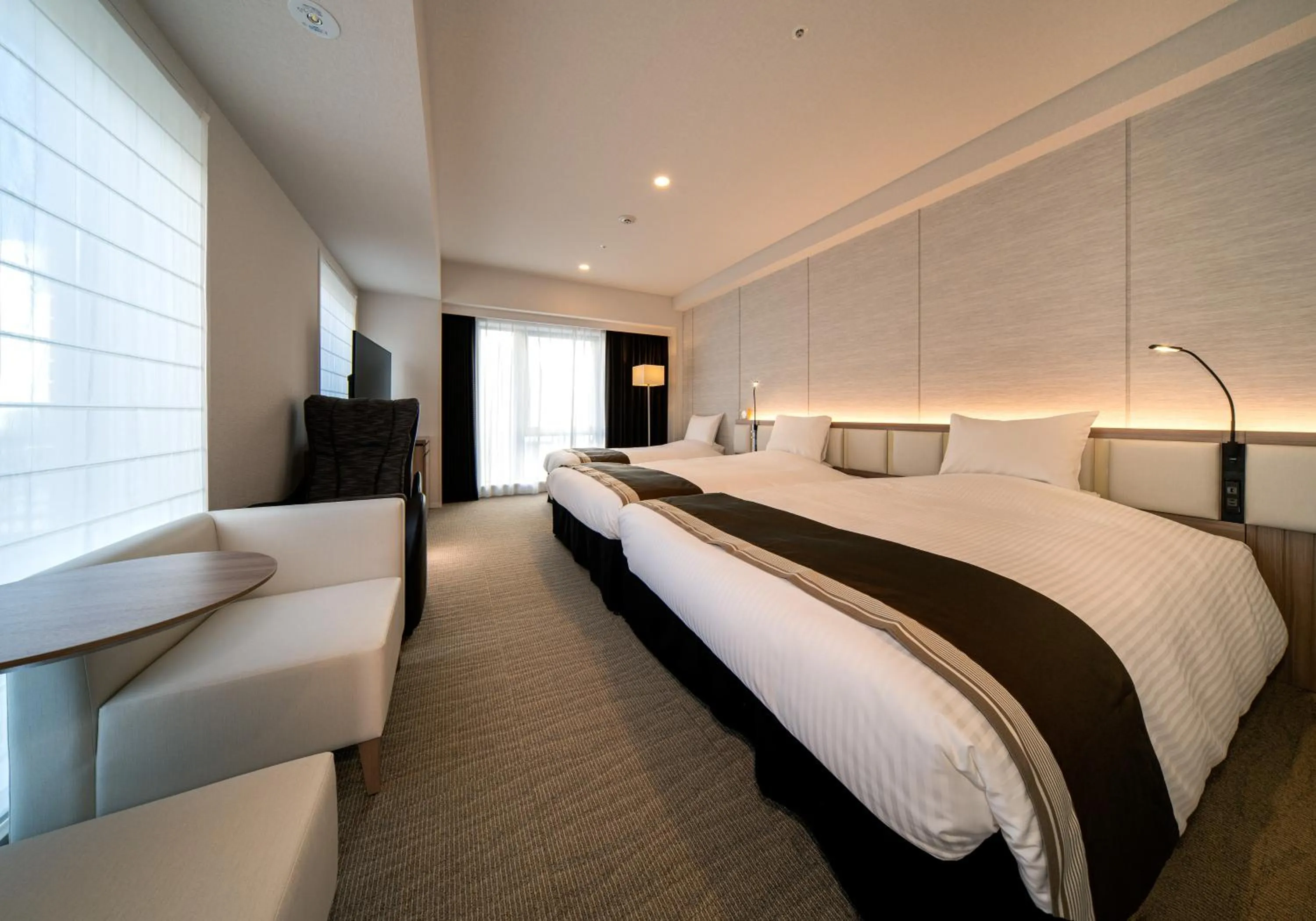 Photo of the whole room, Bed in Daiwa Roynet Hotel Okinawa-Kenchomae