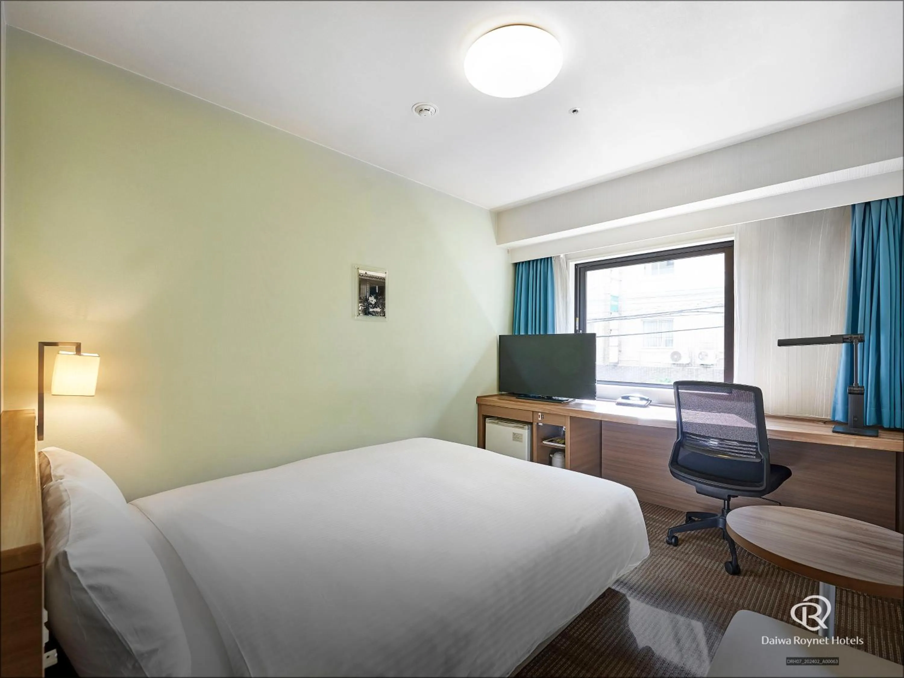 Photo of the whole room, Bed in Daiwa Roynet Hotel Okinawa-Kenchomae