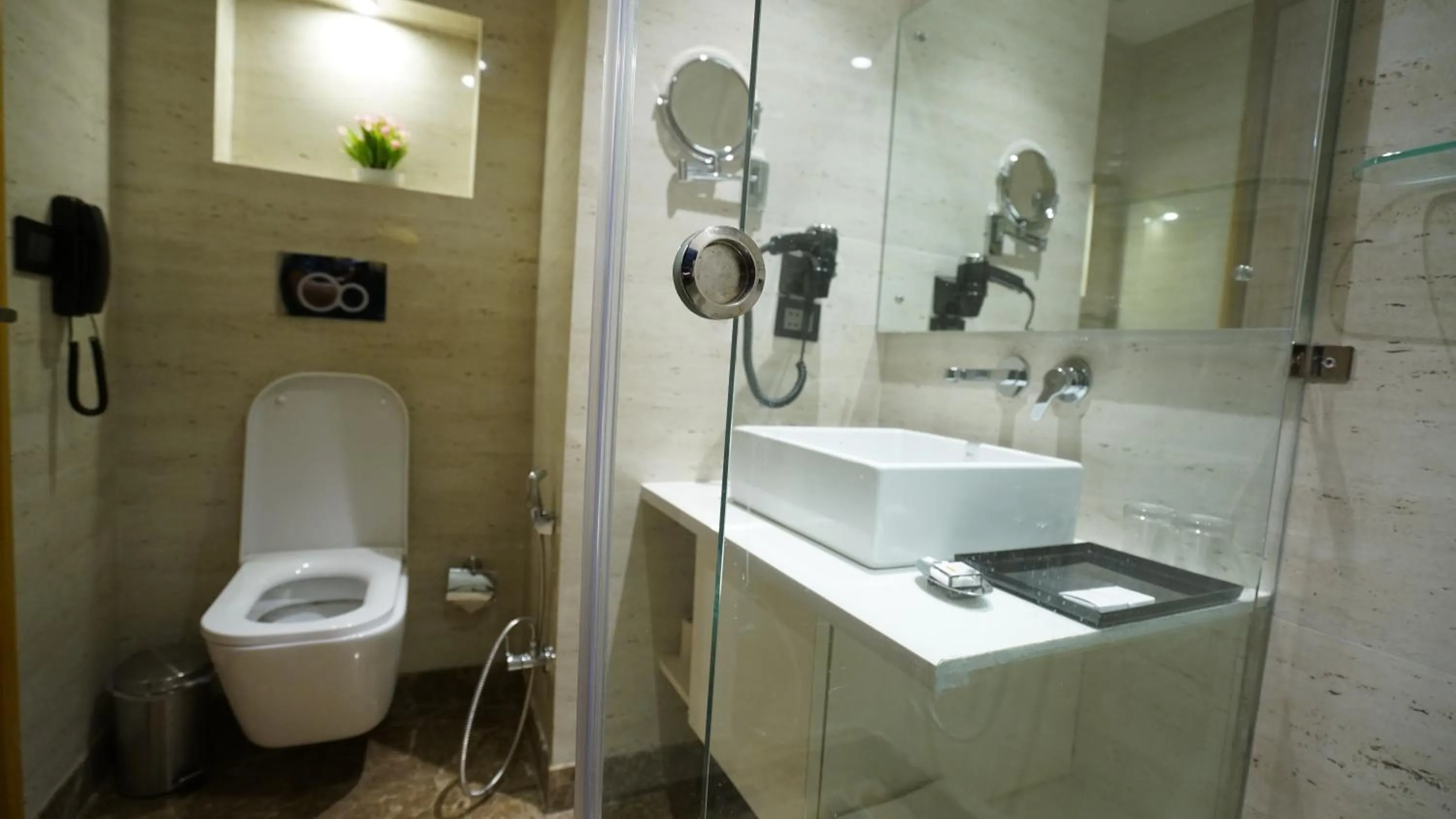 Toilet in Ramada by Wyndham Aligarh GT Road