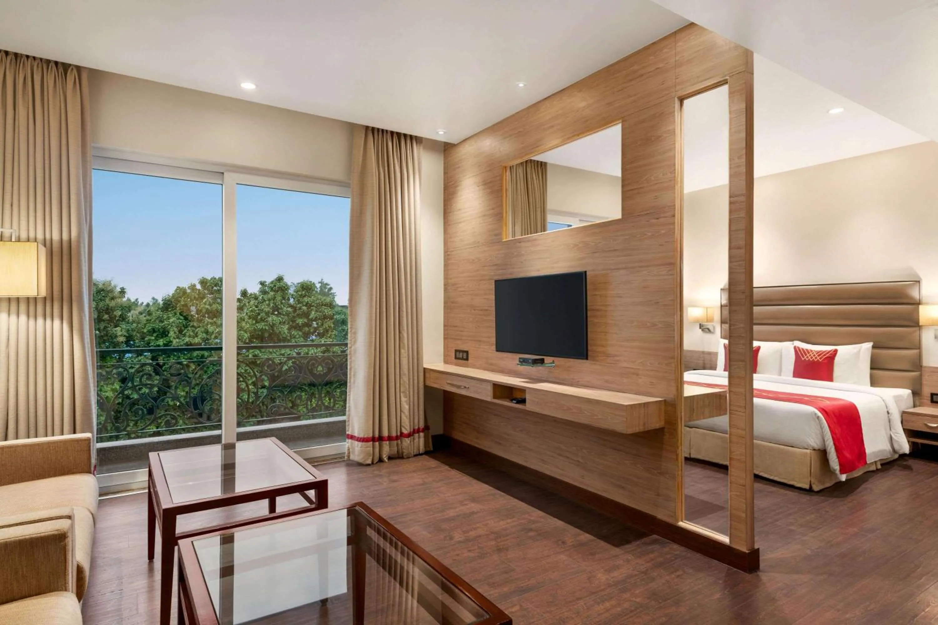 Photo of the whole room, Bed in Ramada by Wyndham Aligarh GT Road