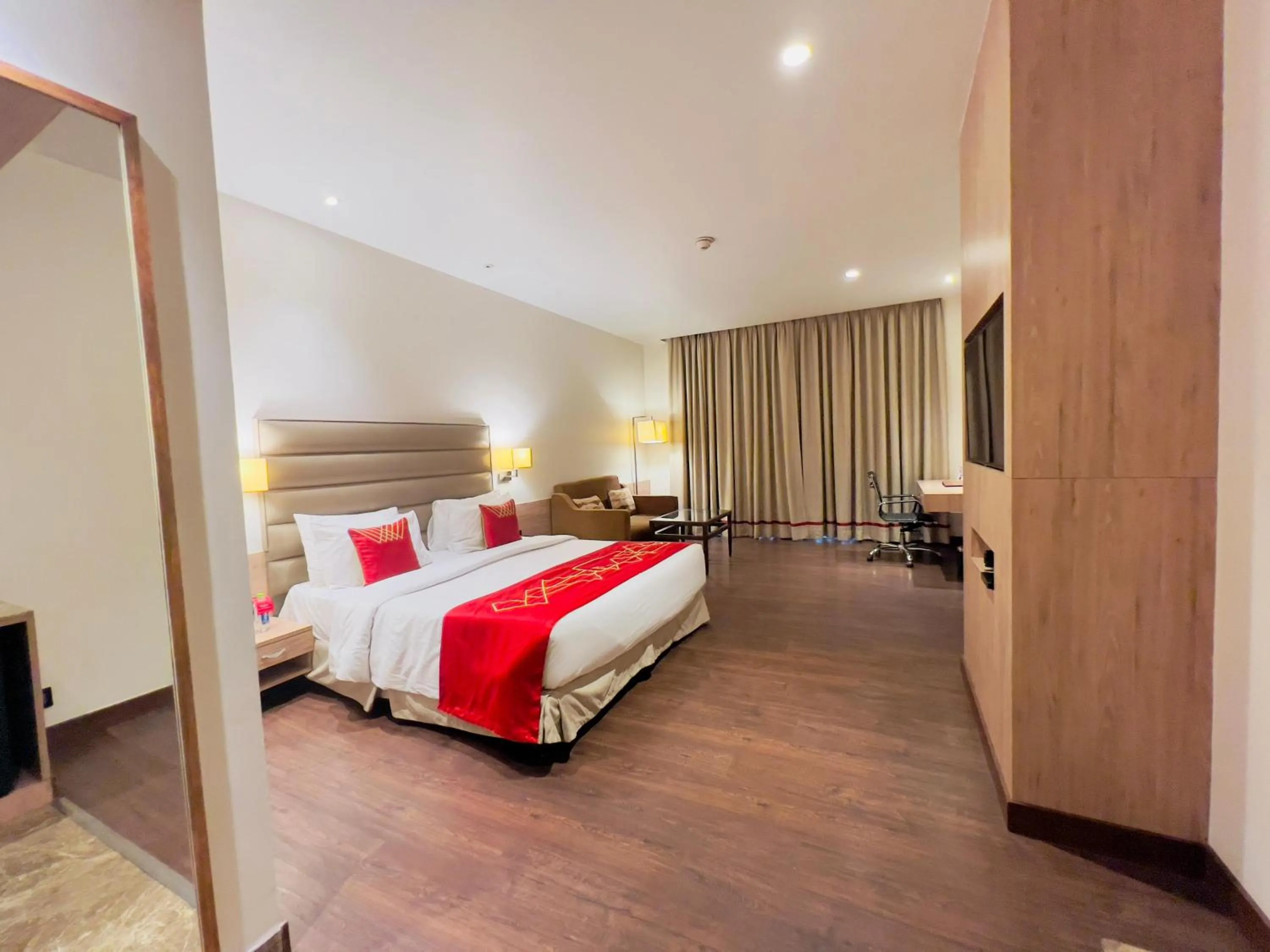 Photo of the whole room, Bed in Ramada by Wyndham Aligarh GT Road