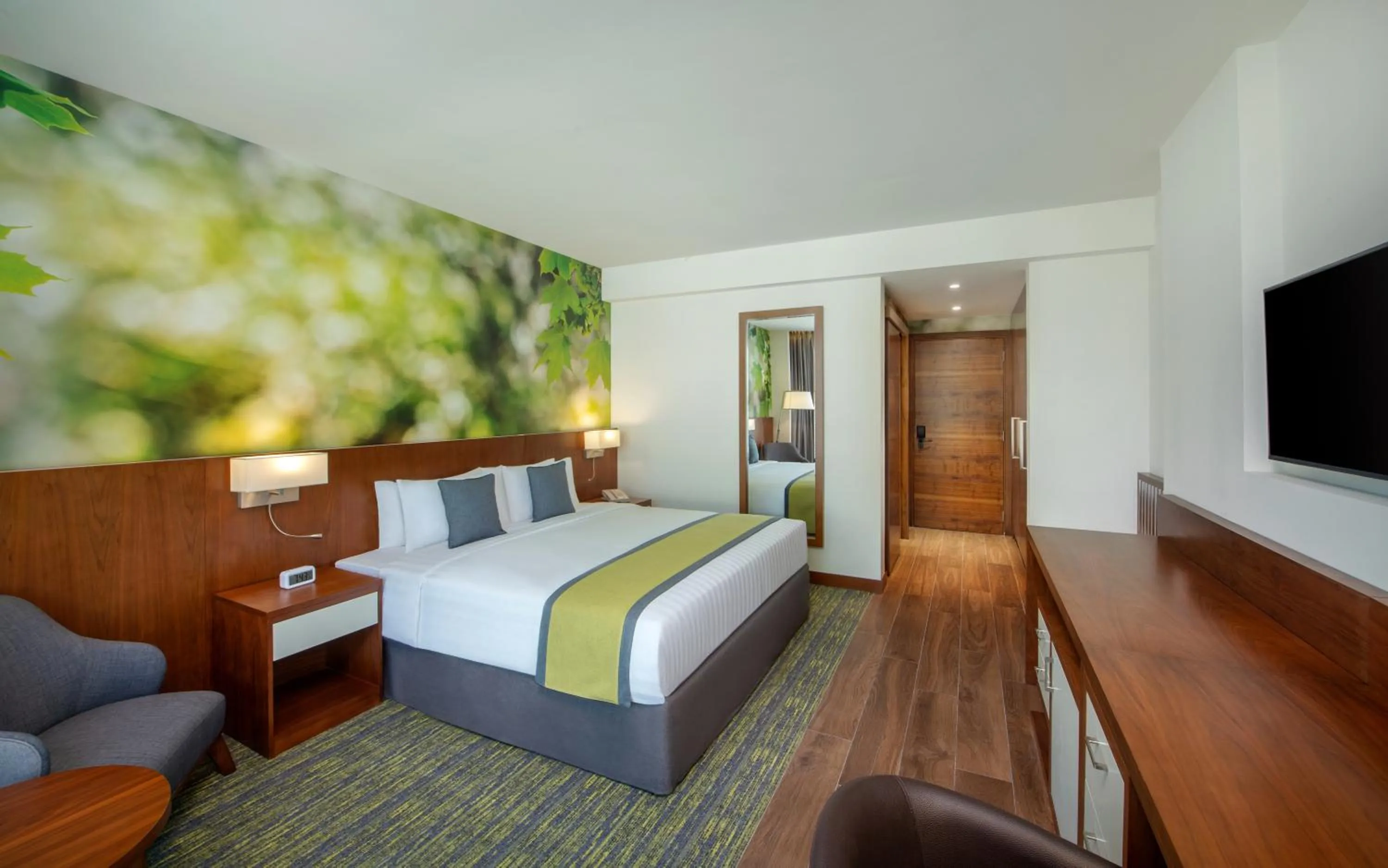 Photo of the whole room, Bed in Wyndham Garden Muscat Al Khuwair