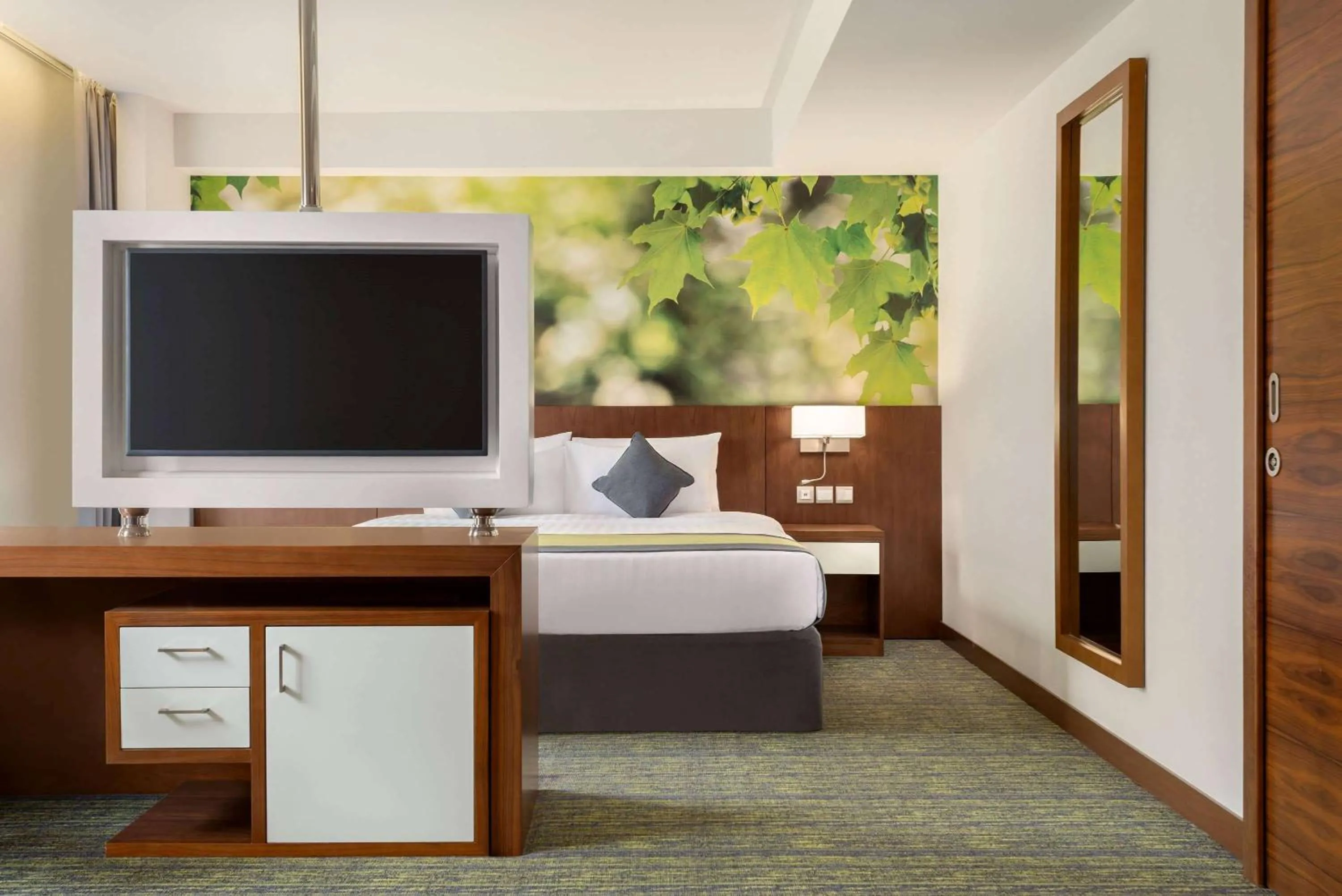 Photo of the whole room, Bed in Wyndham Garden Muscat Al Khuwair