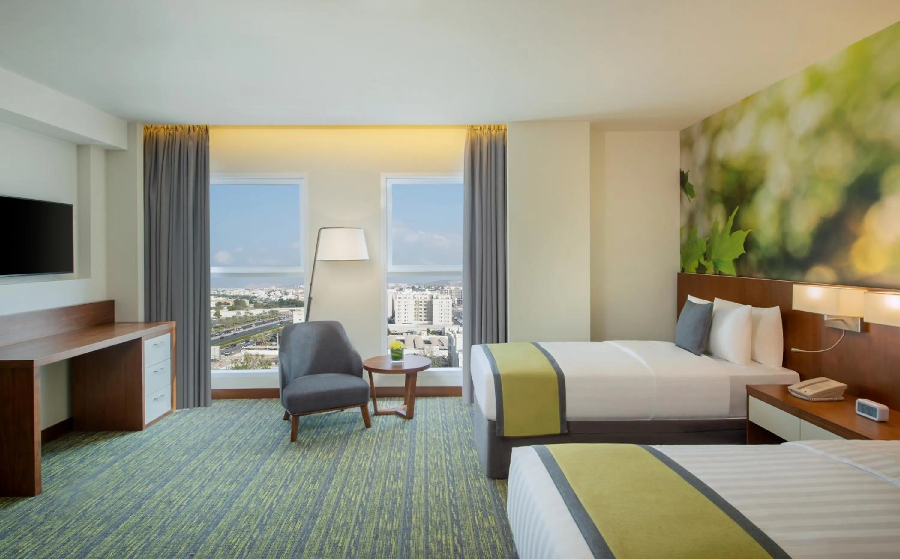 Photo of the whole room, Bed in Wyndham Garden Muscat Al Khuwair