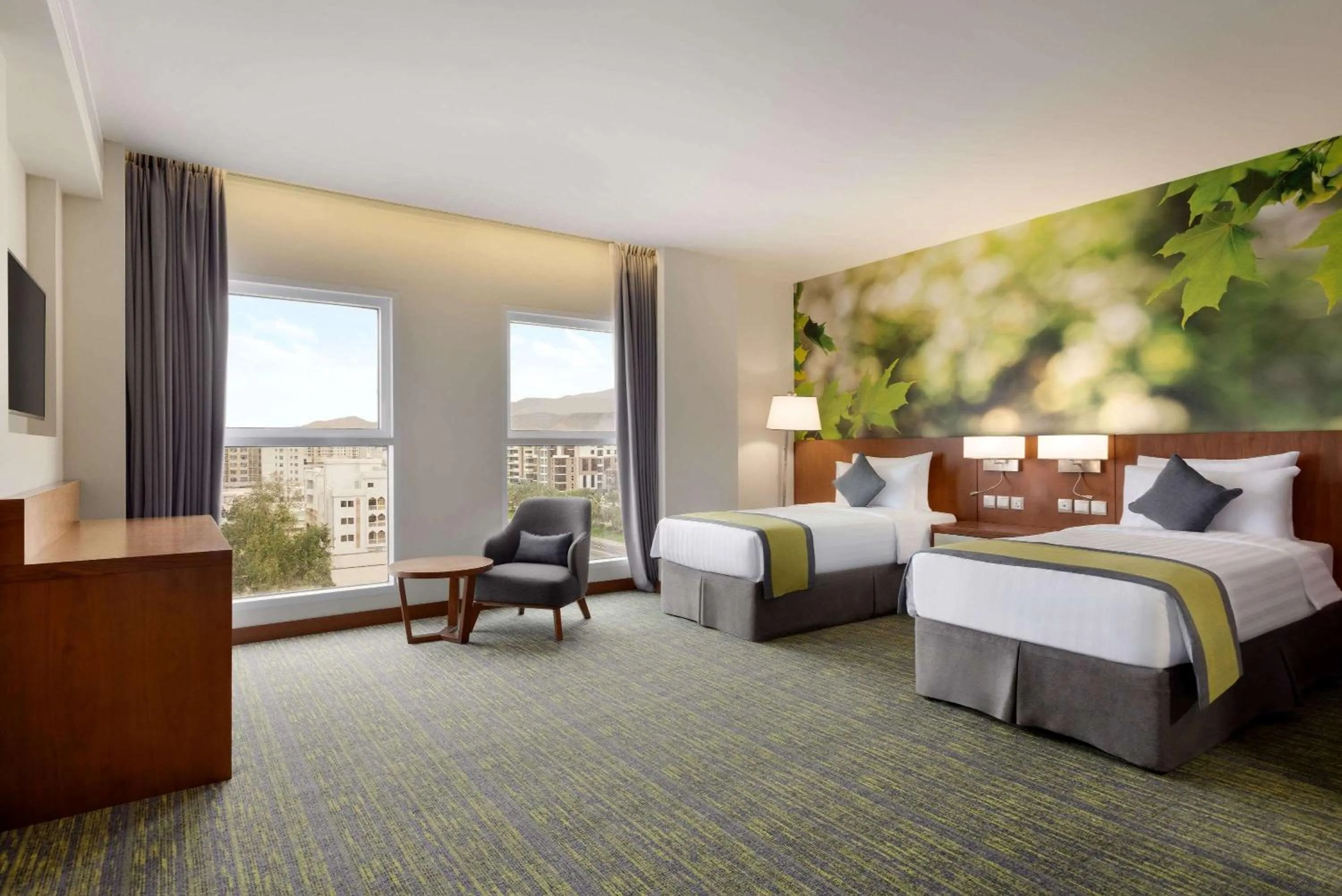 Photo of the whole room, Bed in Wyndham Garden Muscat Al Khuwair