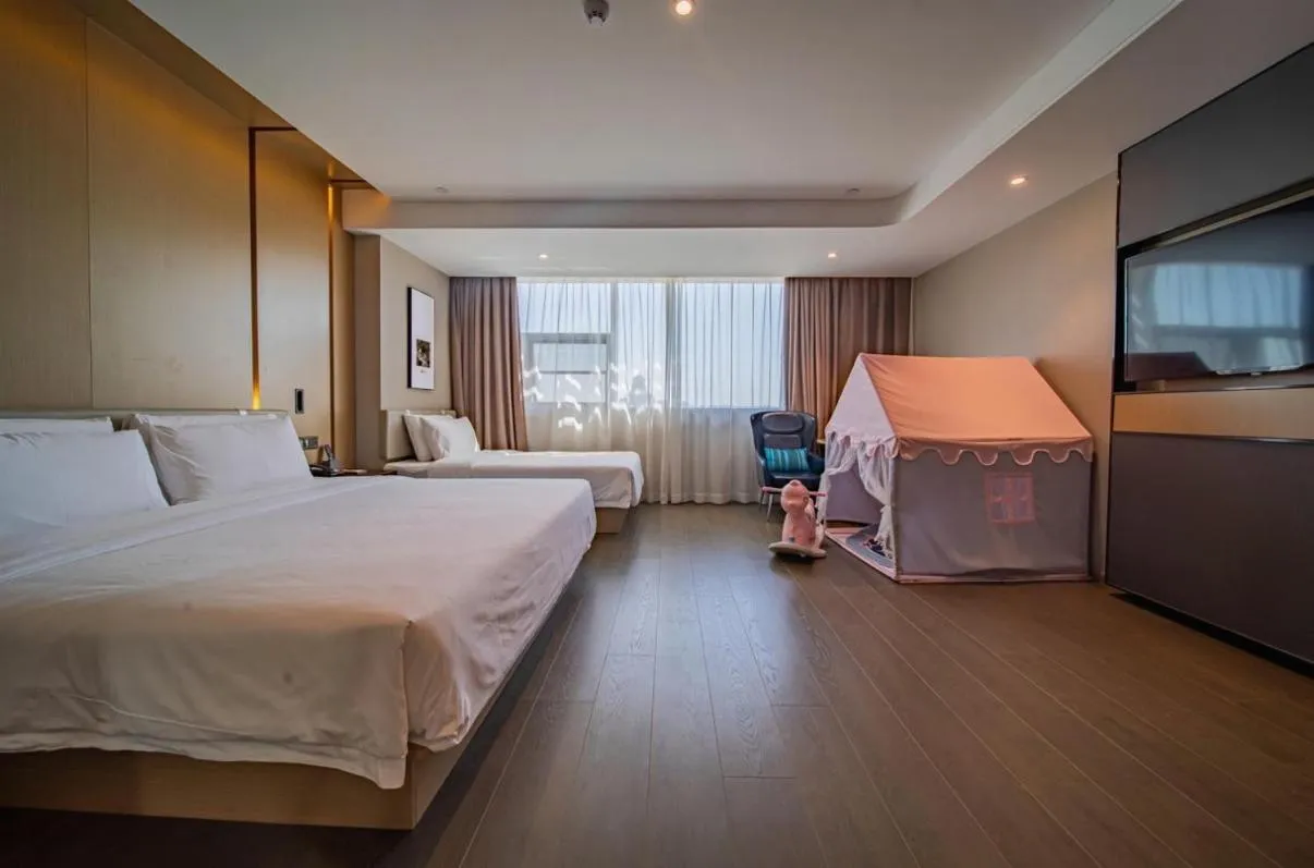 Bed in Atour Hotel Nanjing Olympic Center