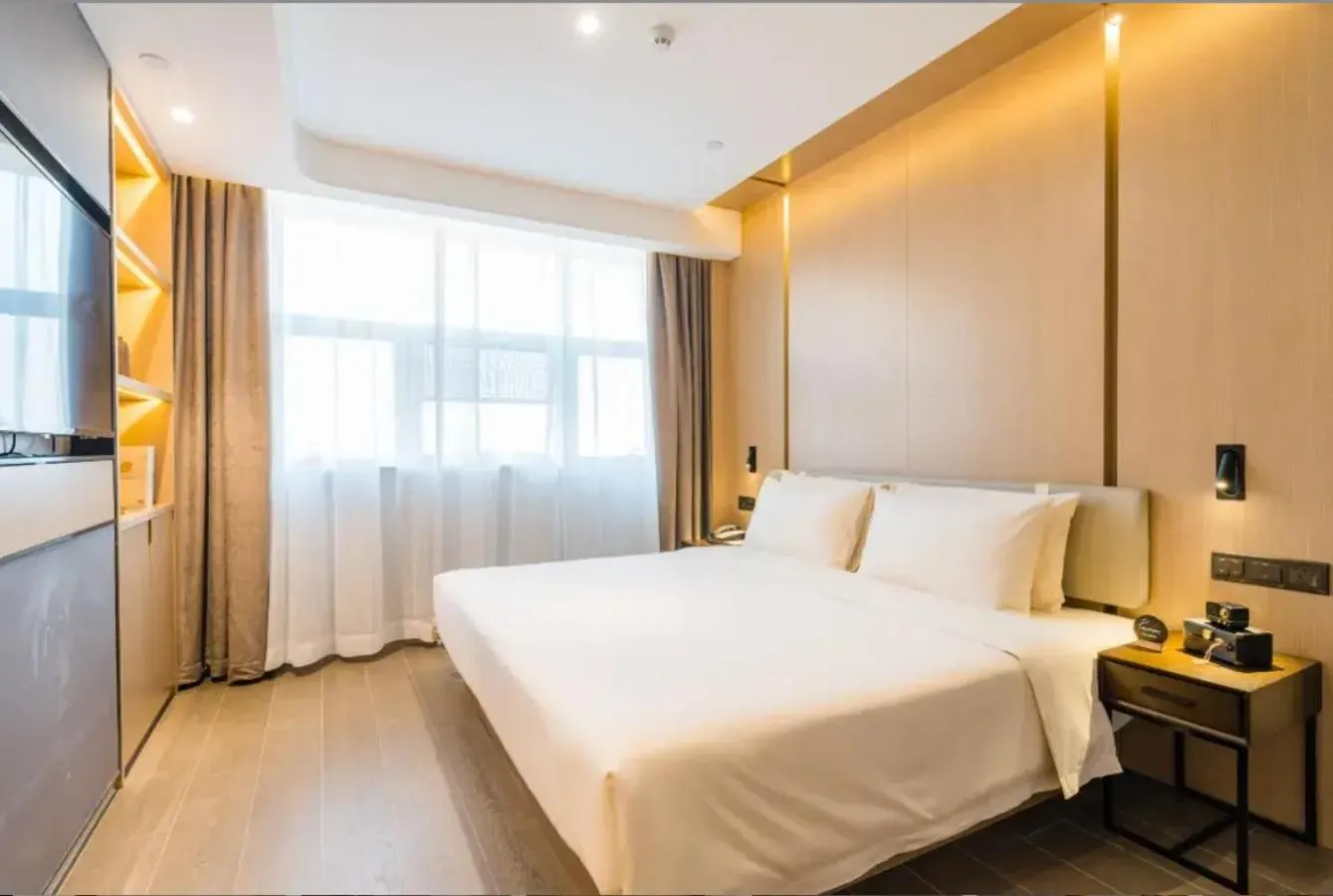 Bed in Atour Hotel Nanjing Olympic Center