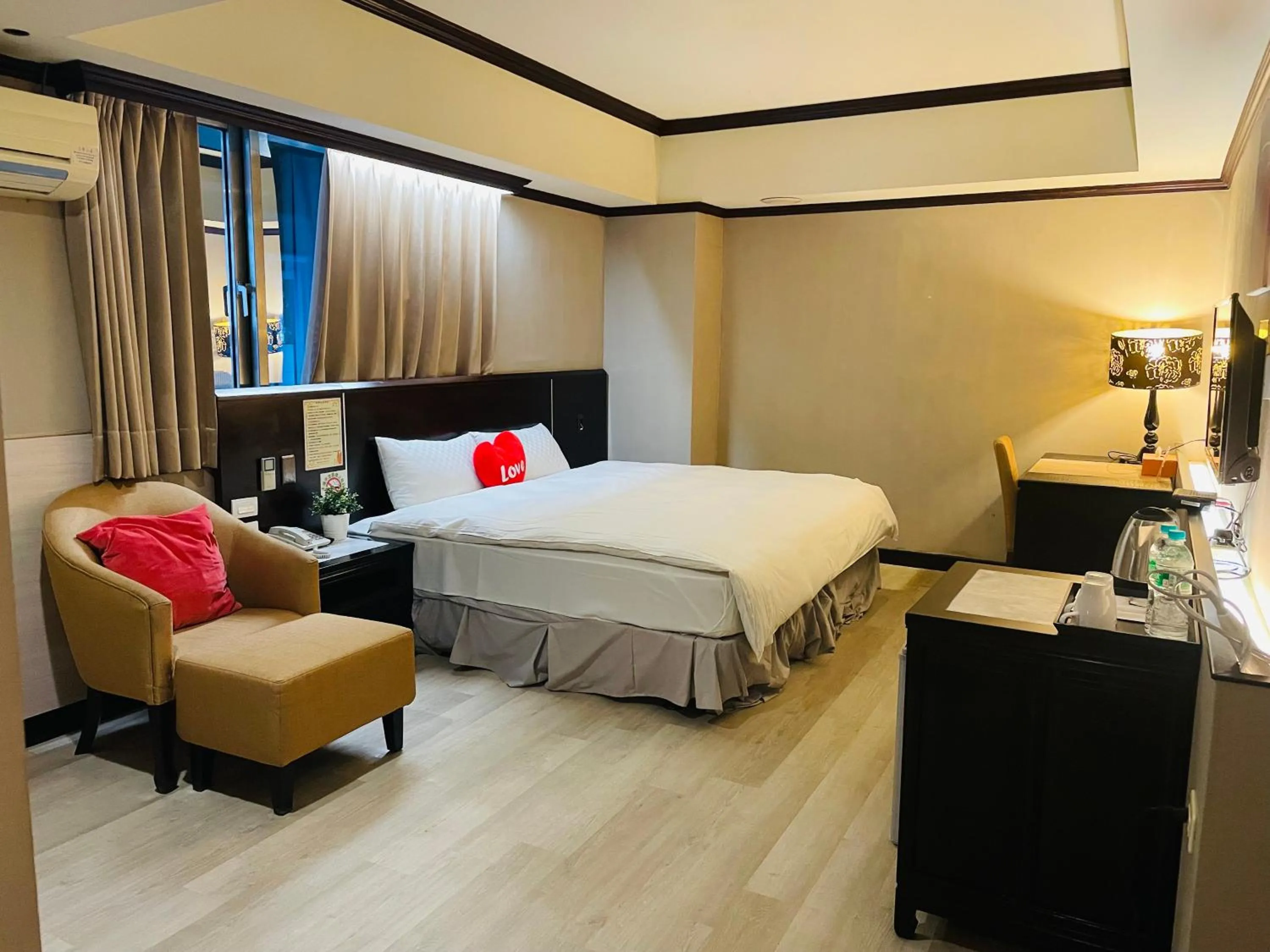 Bed in Felicity Business Hotel