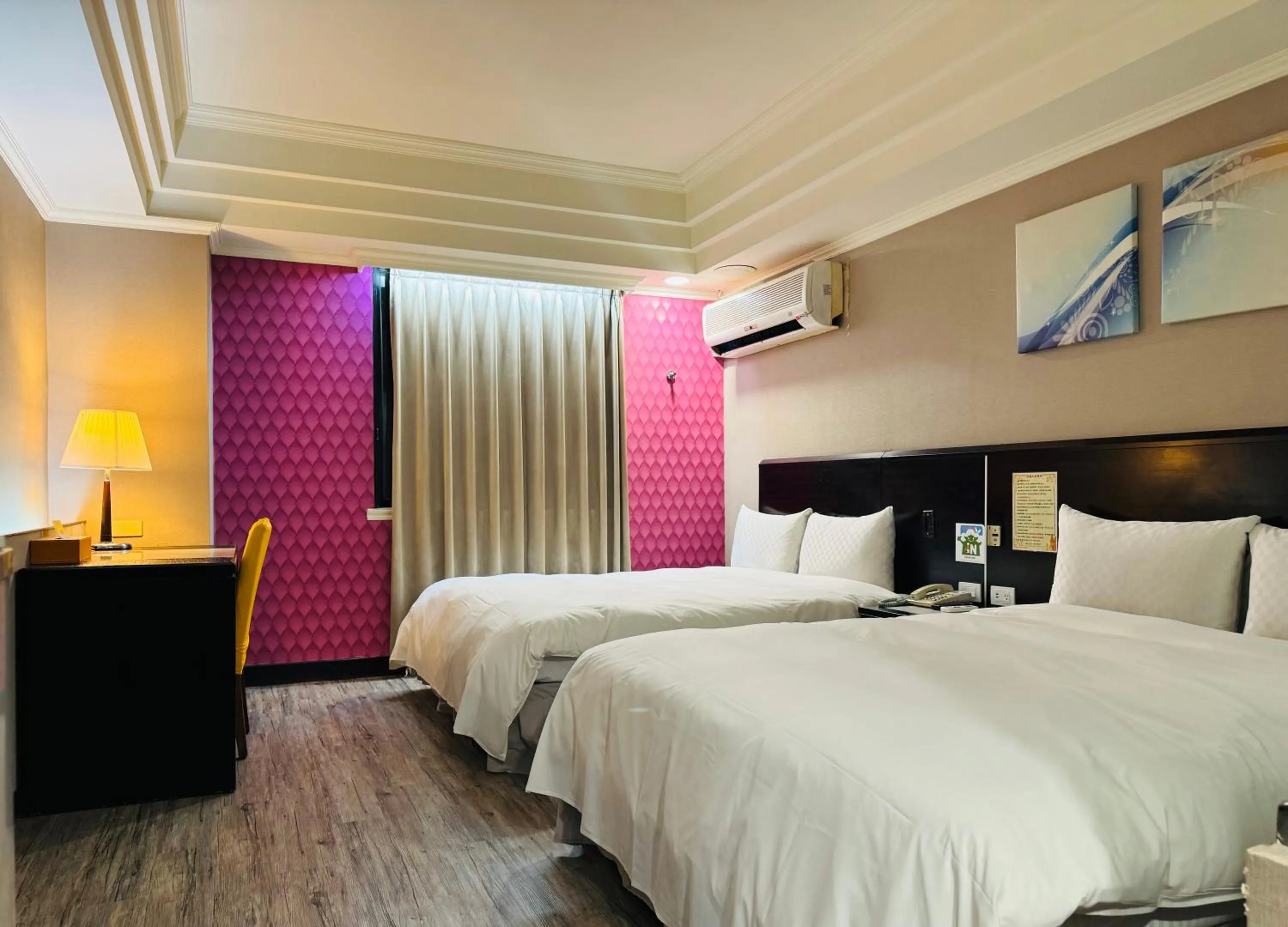 Bed in Felicity Business Hotel