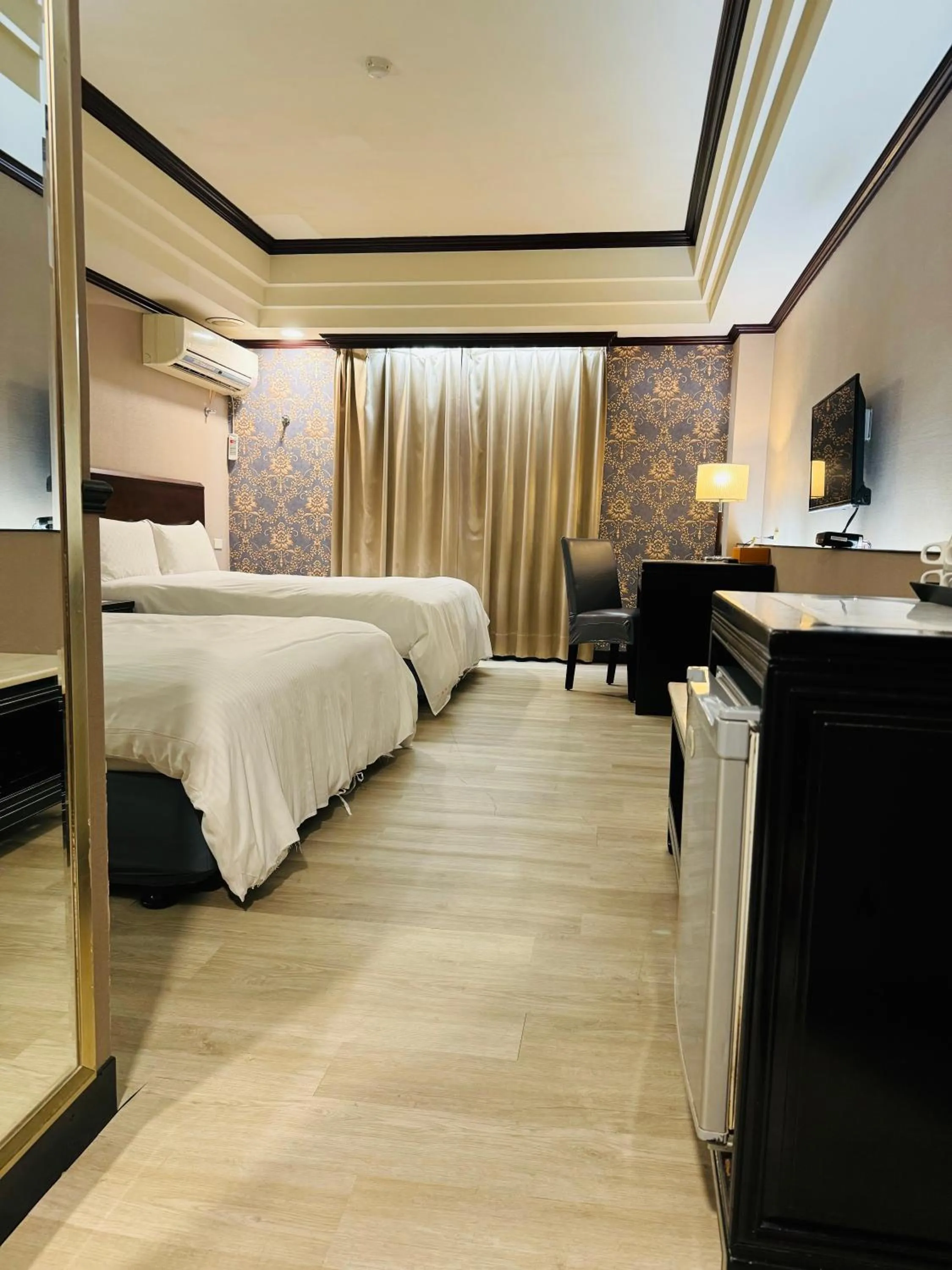 Bed in Felicity Business Hotel