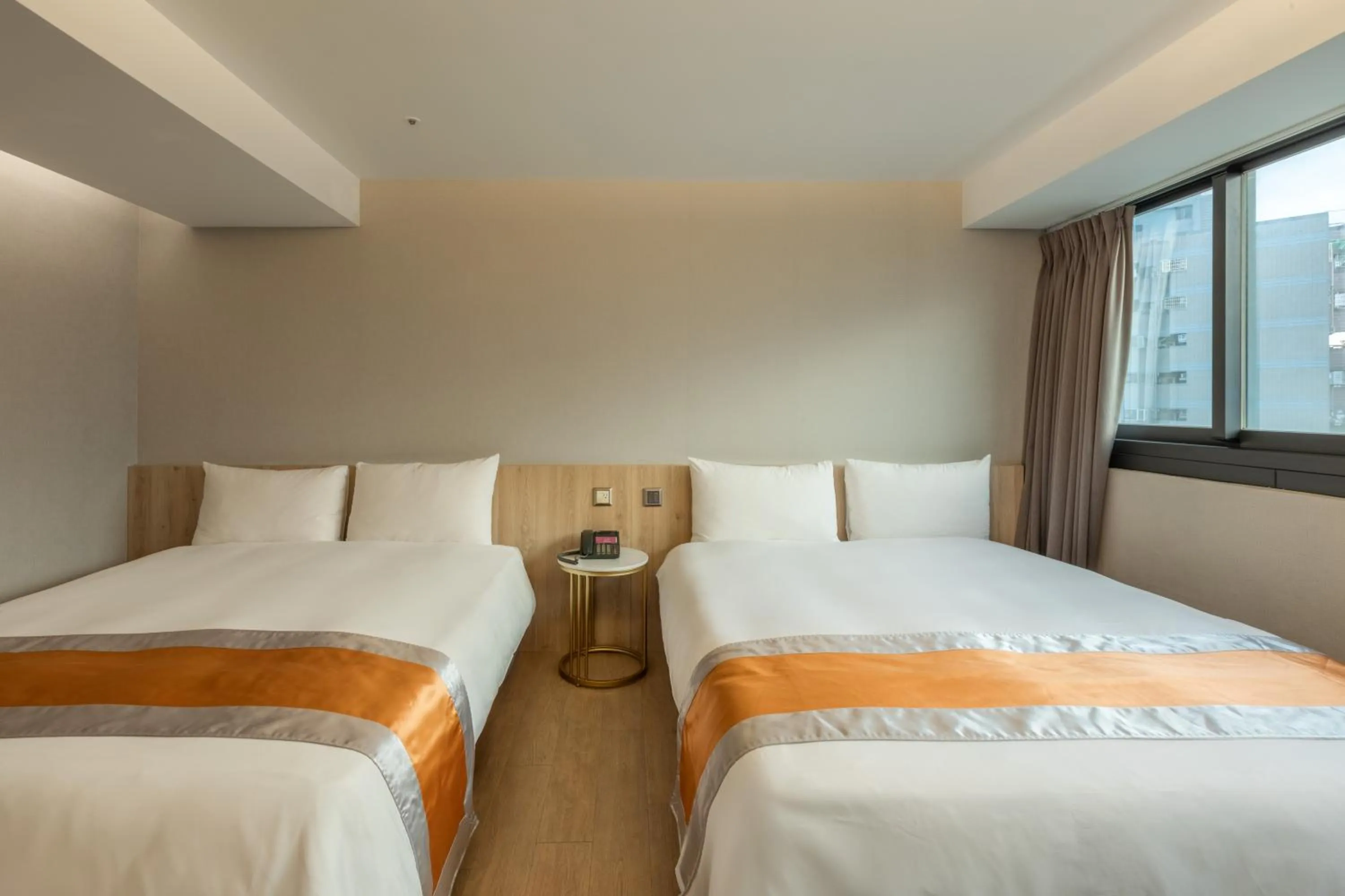 Bed in Ren Mei Fashion Hotel