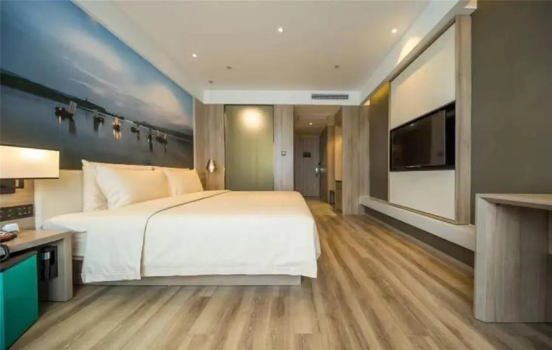 Bed in Atour Hotel Hangzhou Binjiang Jiangling Road