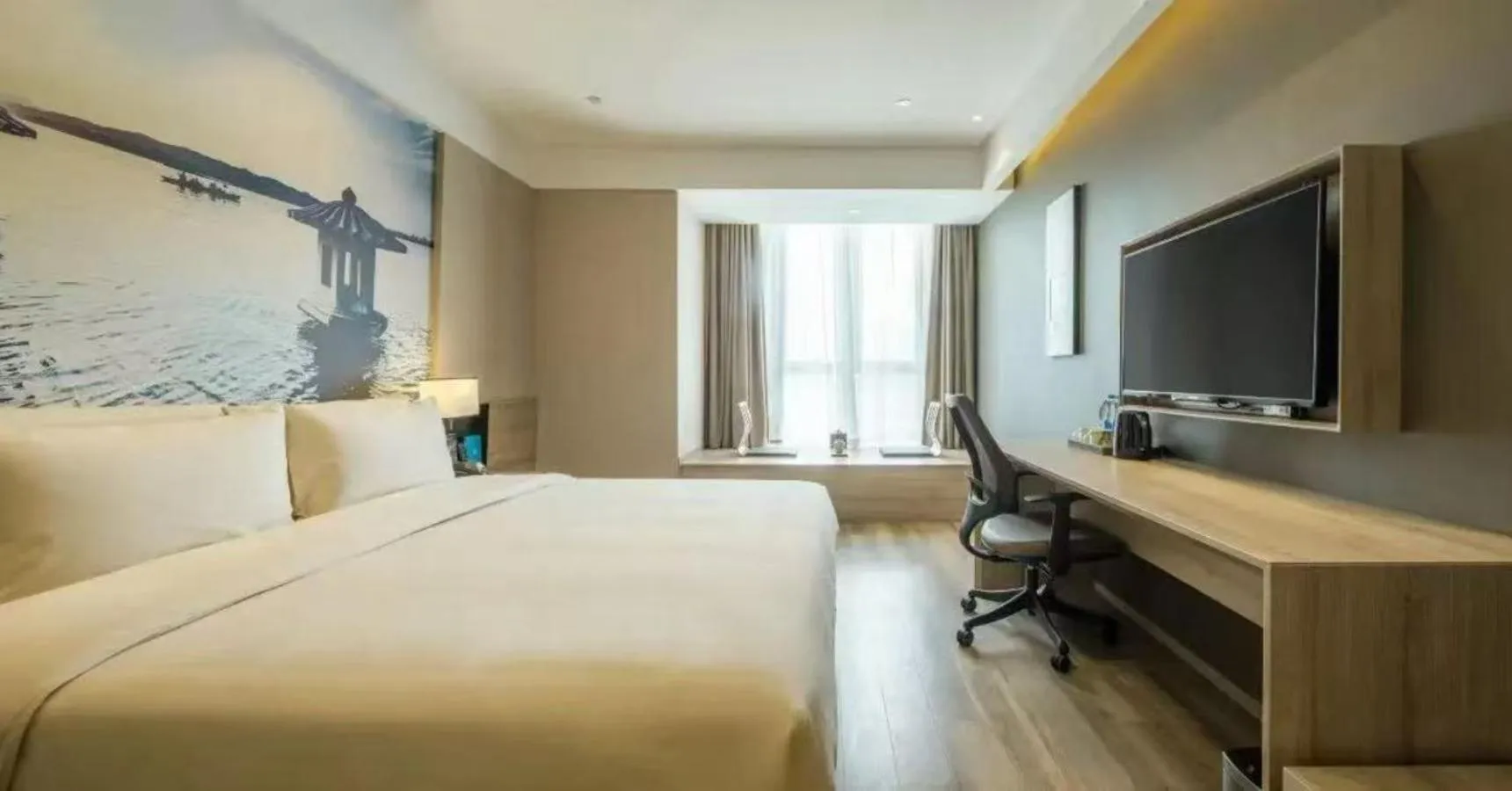Bed in Atour Hotel Hangzhou Binjiang Jiangling Road