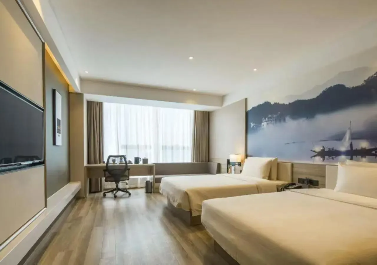 Bed in Atour Hotel Hangzhou Binjiang Jiangling Road