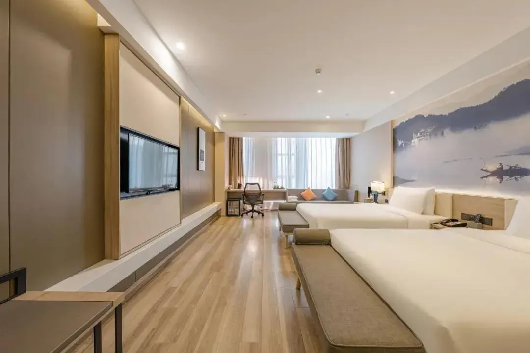 Bed in Atour Hotel Hangzhou Binjiang Jiangling Road