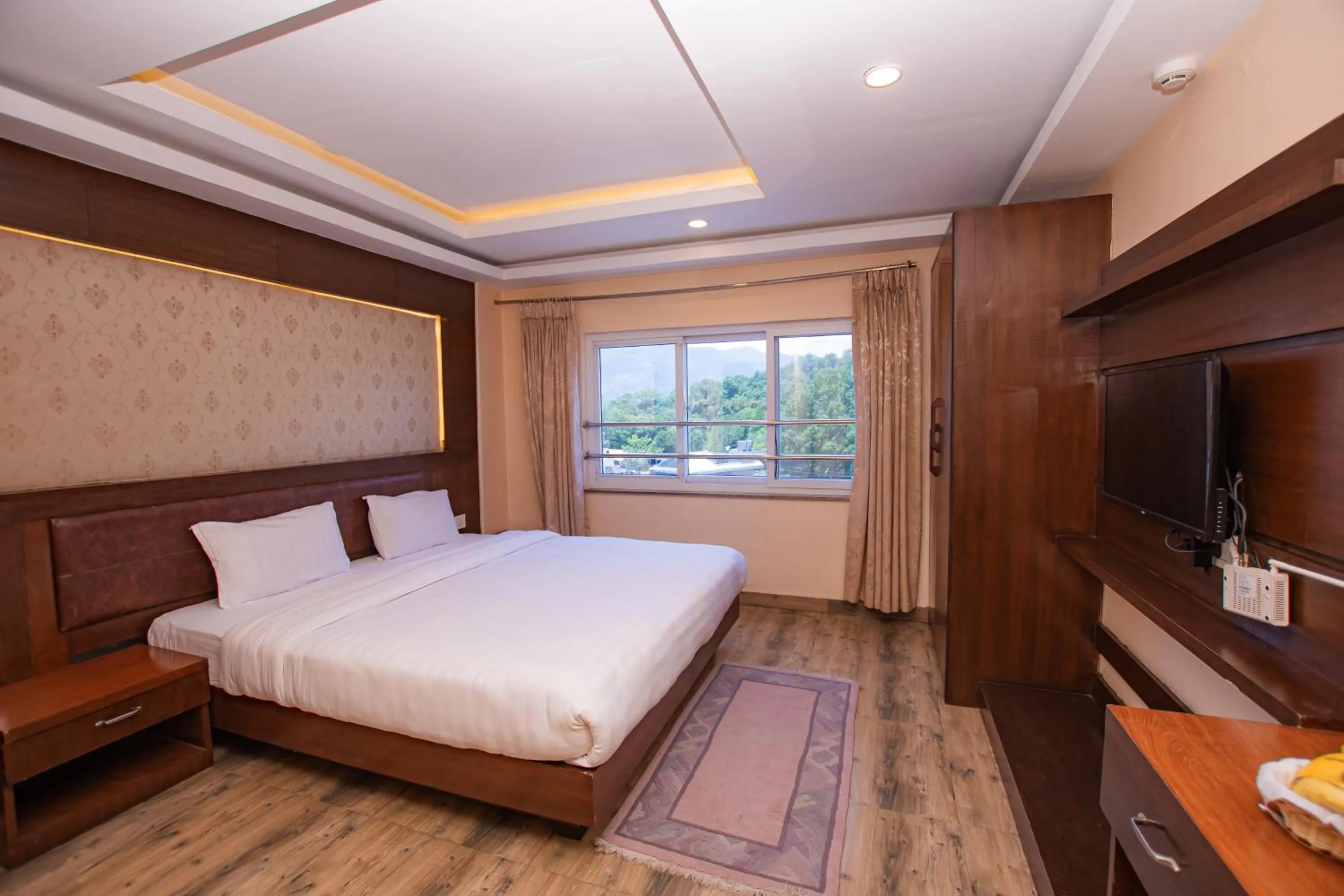 Bed in Hotel Yellow Pagoda Pokhara