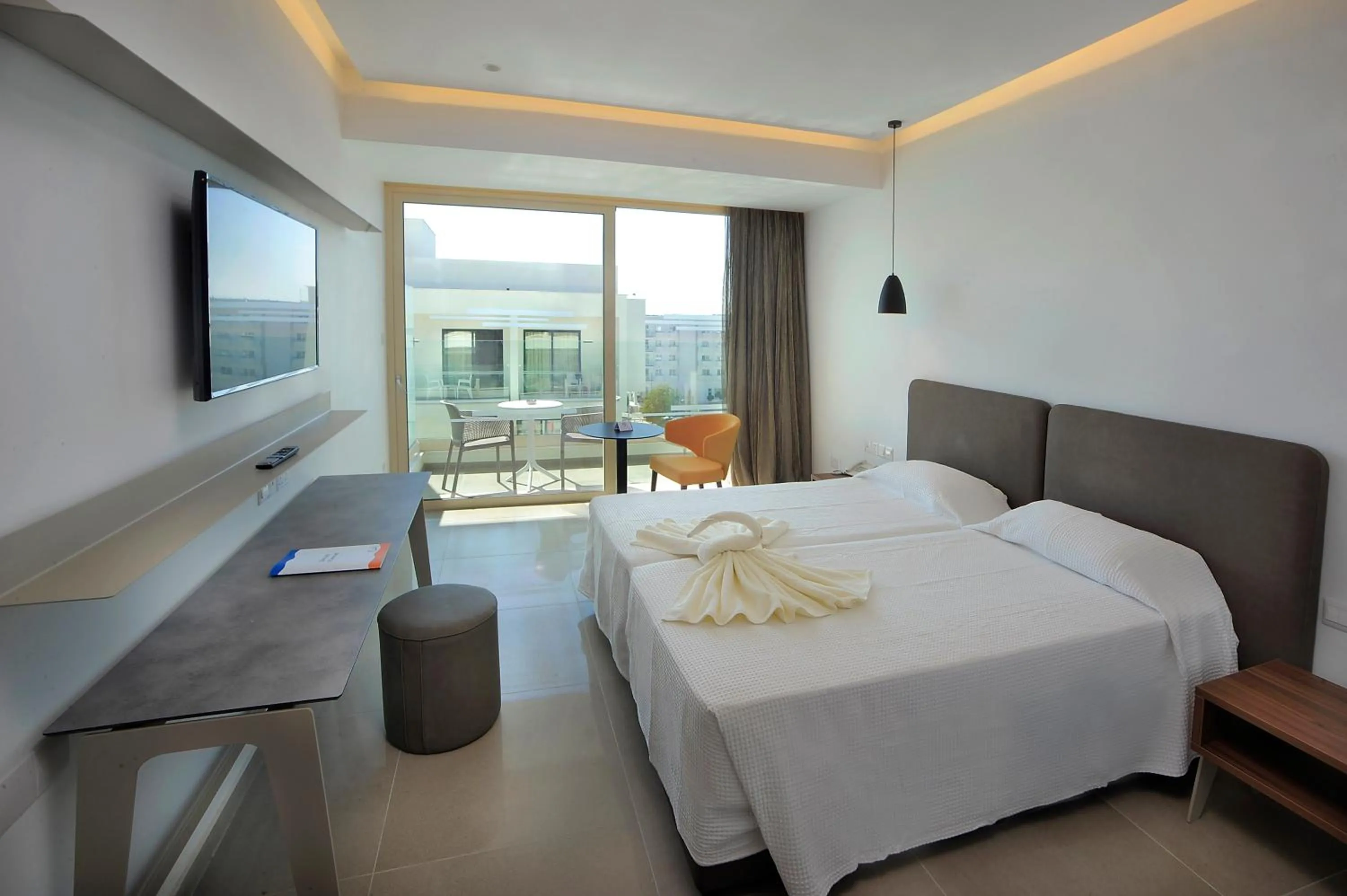Bed in Nelia Beach Hotel & Spa