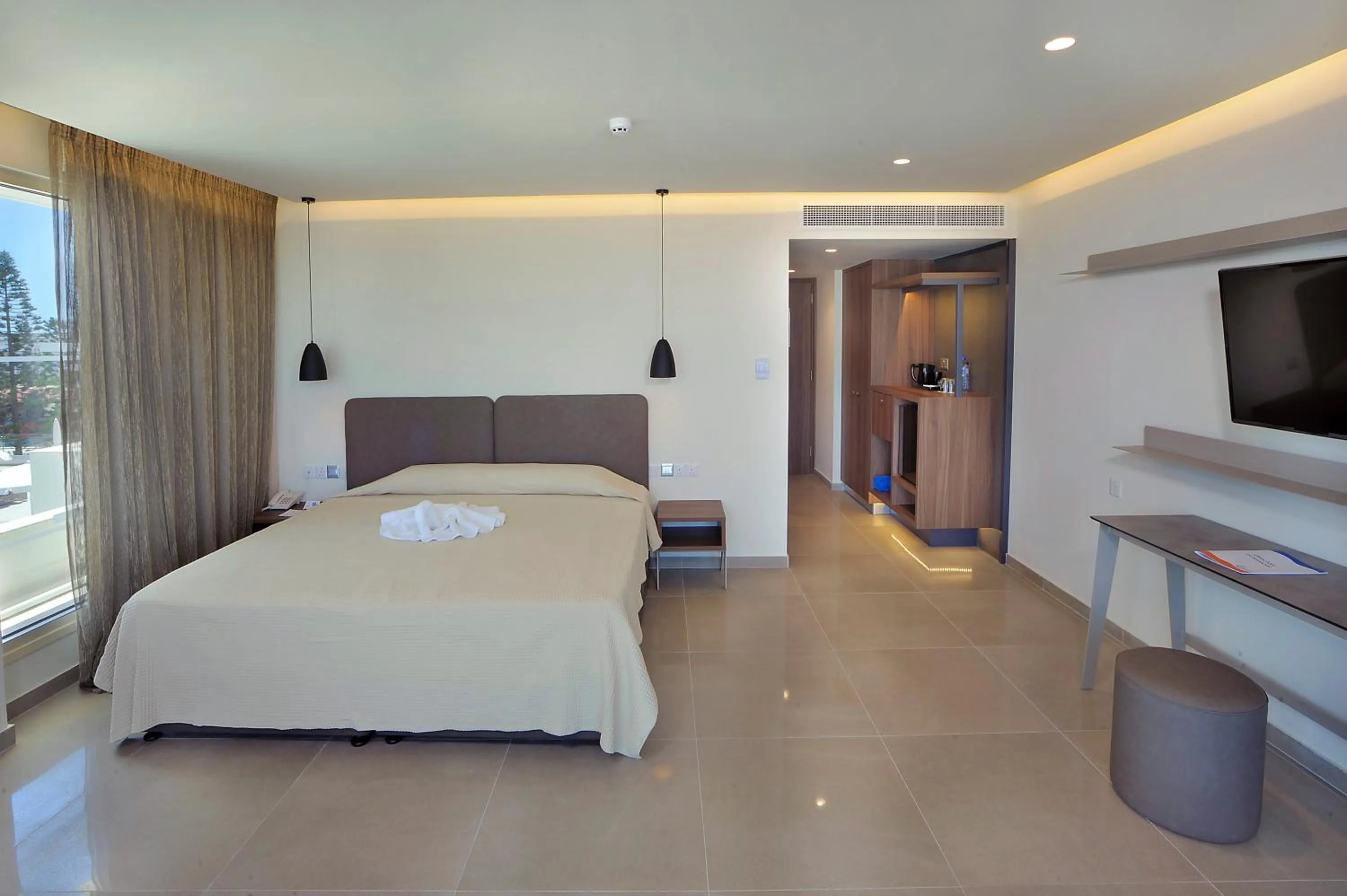 Bed in Nelia Beach Hotel & Spa