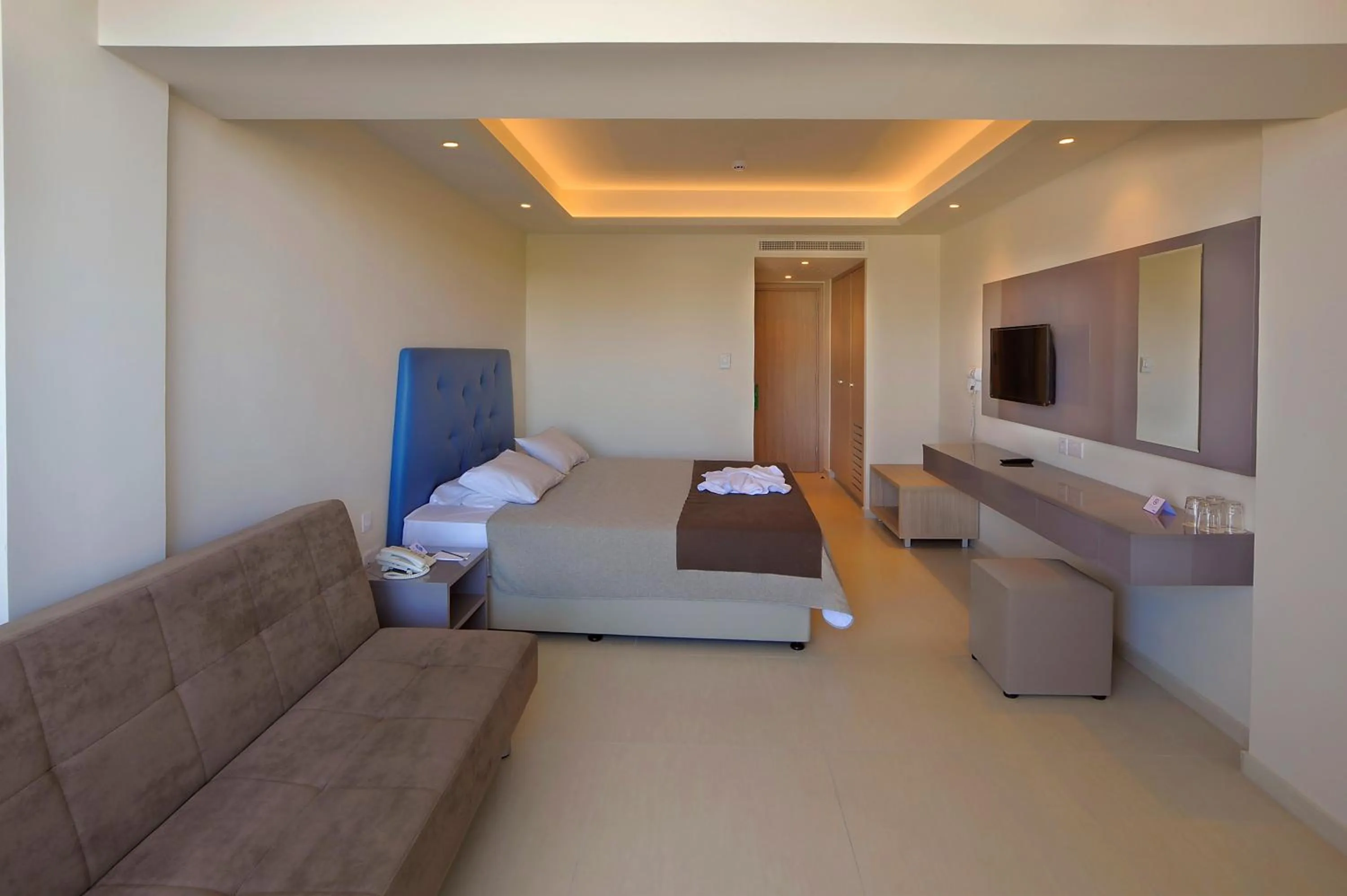 Photo of the whole room, Bed in Nelia Beach Hotel & Spa