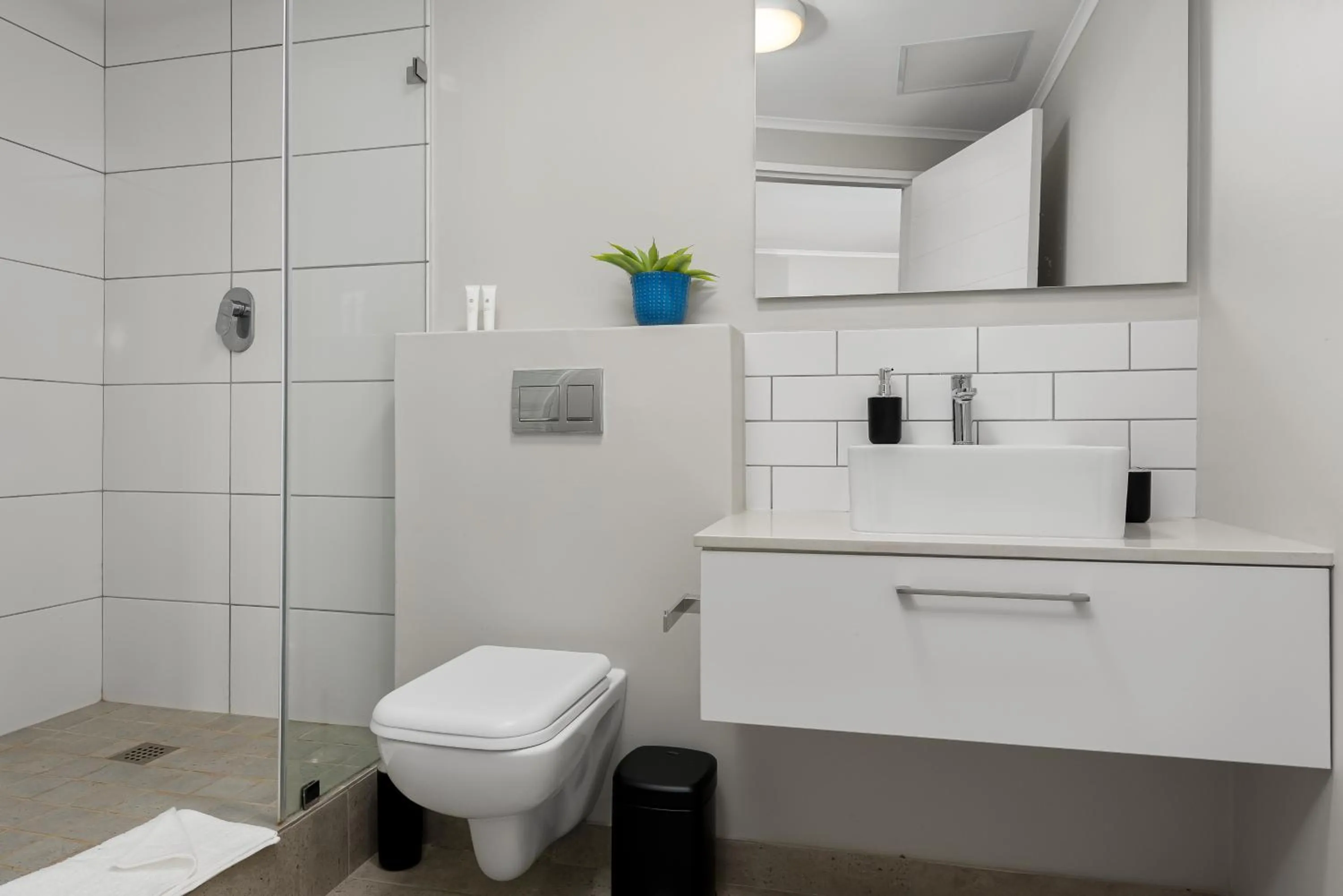 Shower in Urban Artisan Luxury Suites by Totalstay