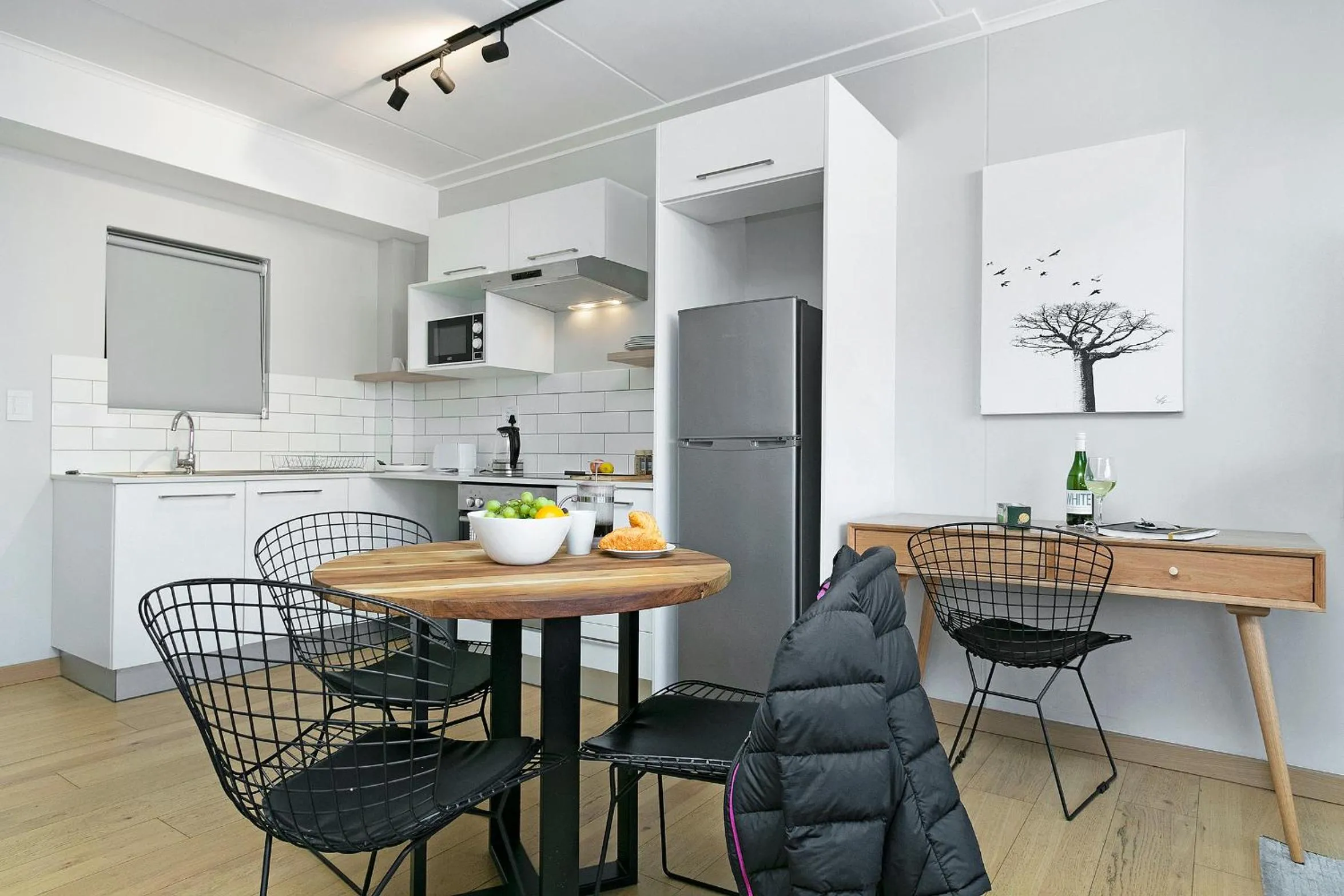 Dining area in Urban Artisan Luxury Suites by Totalstay