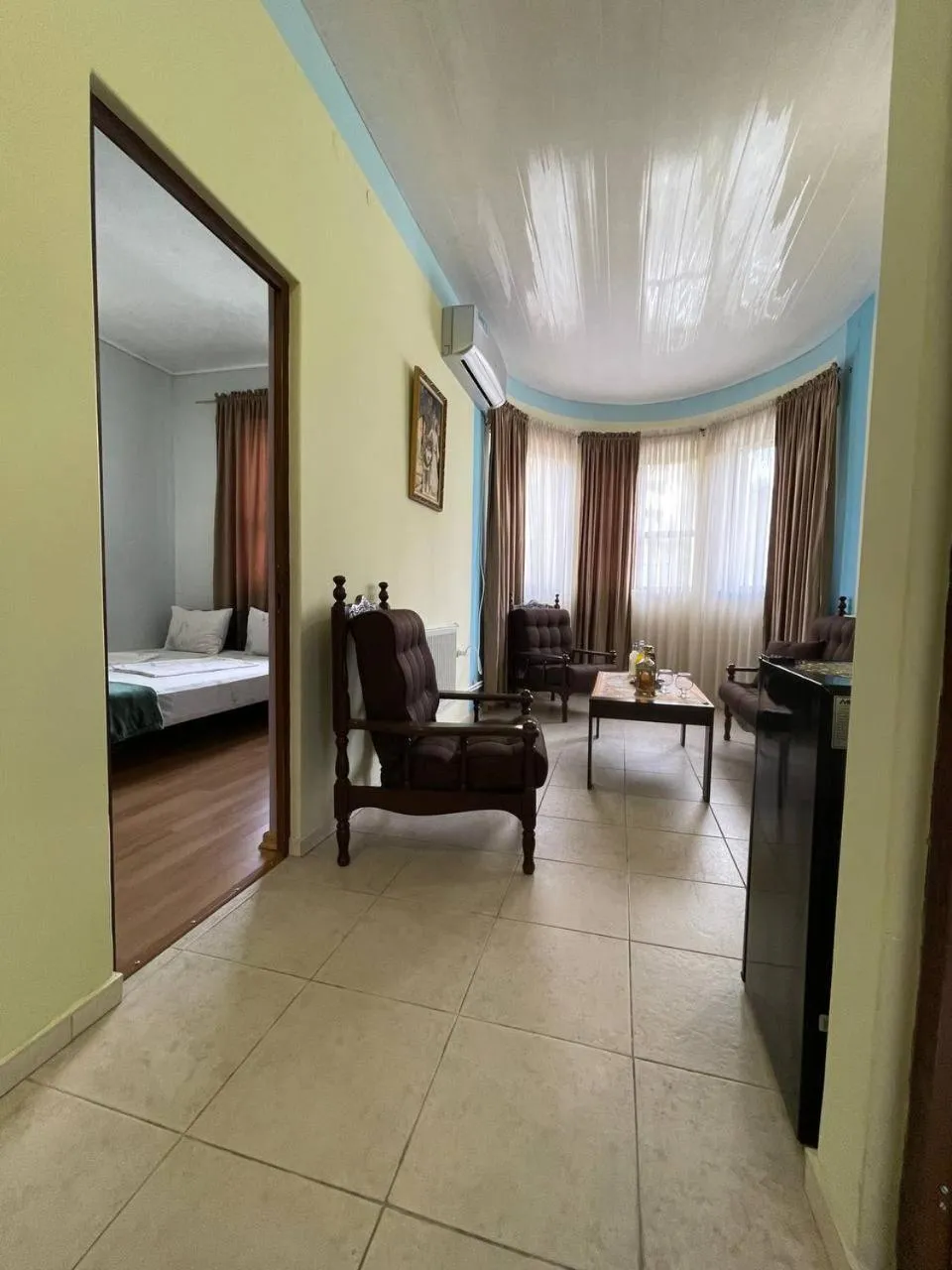 Living room, Bed in ALEM Hotel