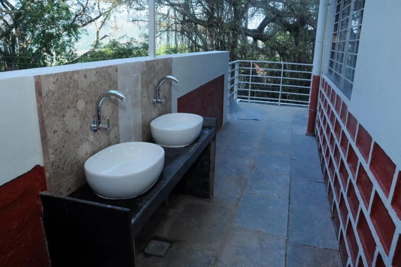 Toilet in Rutu's Holidays Resort Panhala