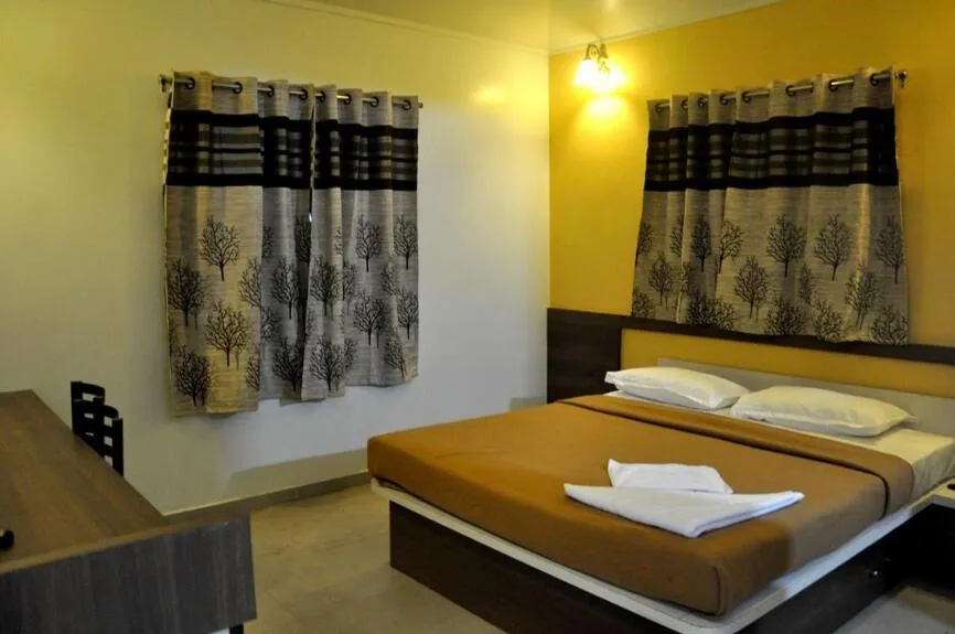 Bedroom, Bed in Rutu's Holidays Resort Panhala
