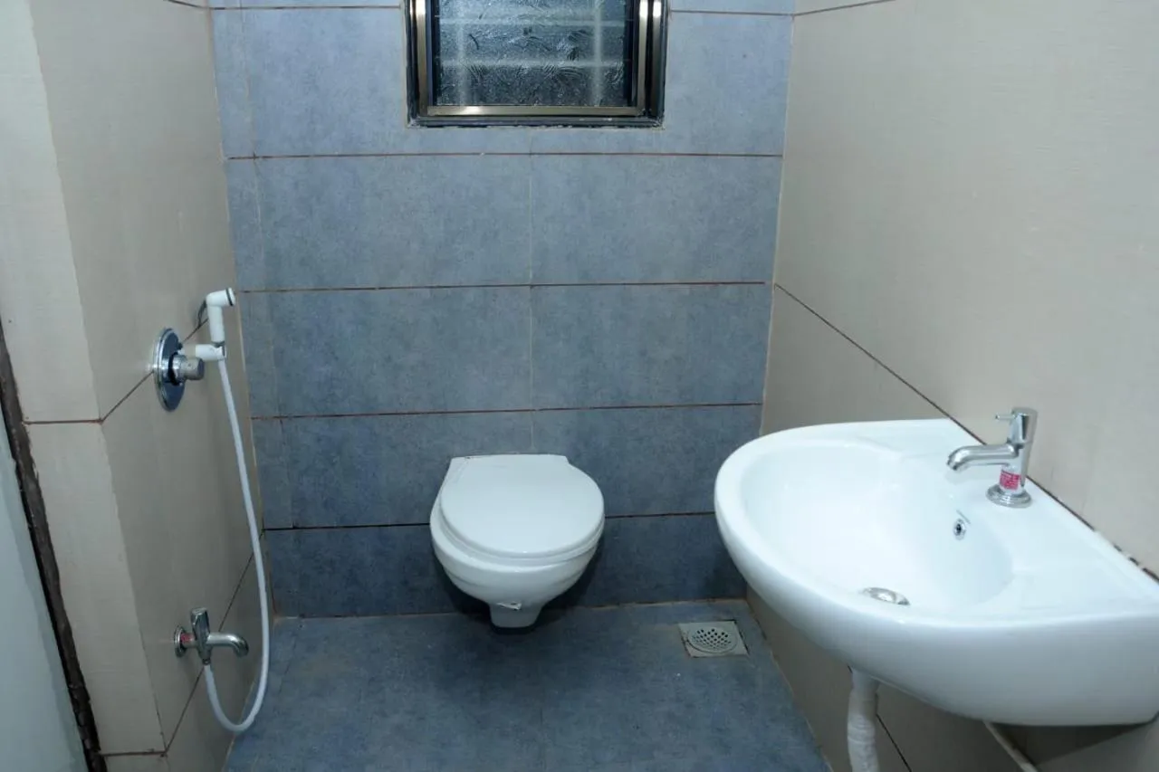 Toilet in Rutu's Holidays Resort Panhala