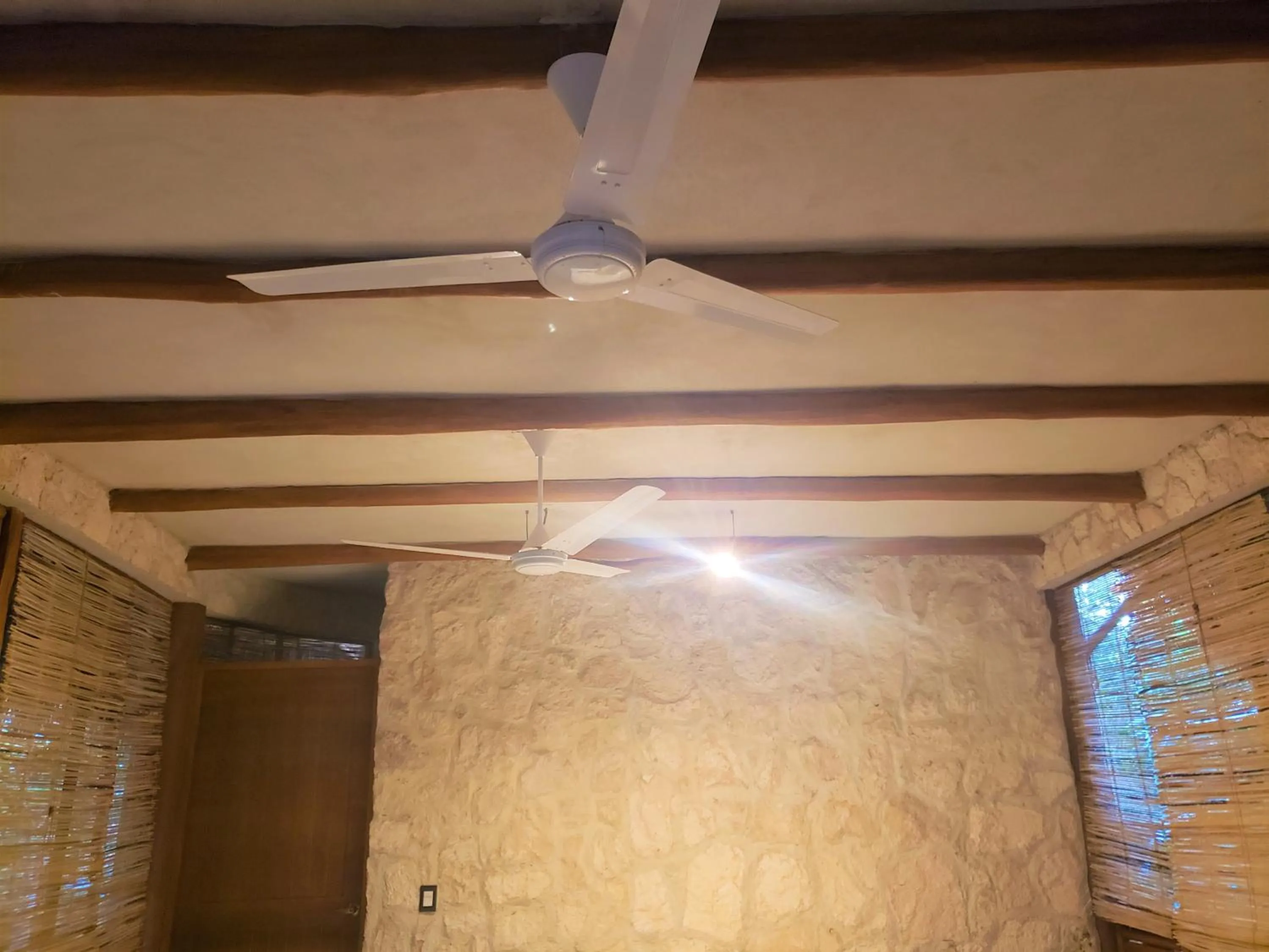 Photo of the whole room in Aldea Maya-Ha Cabañas con cenotes