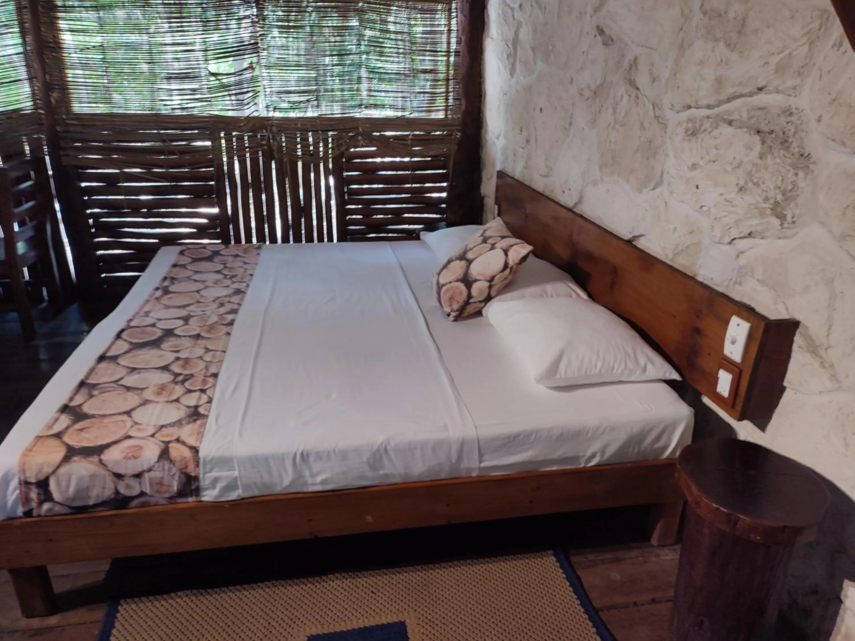 Bed in Aldea Maya-Ha Cabañas con cenotes