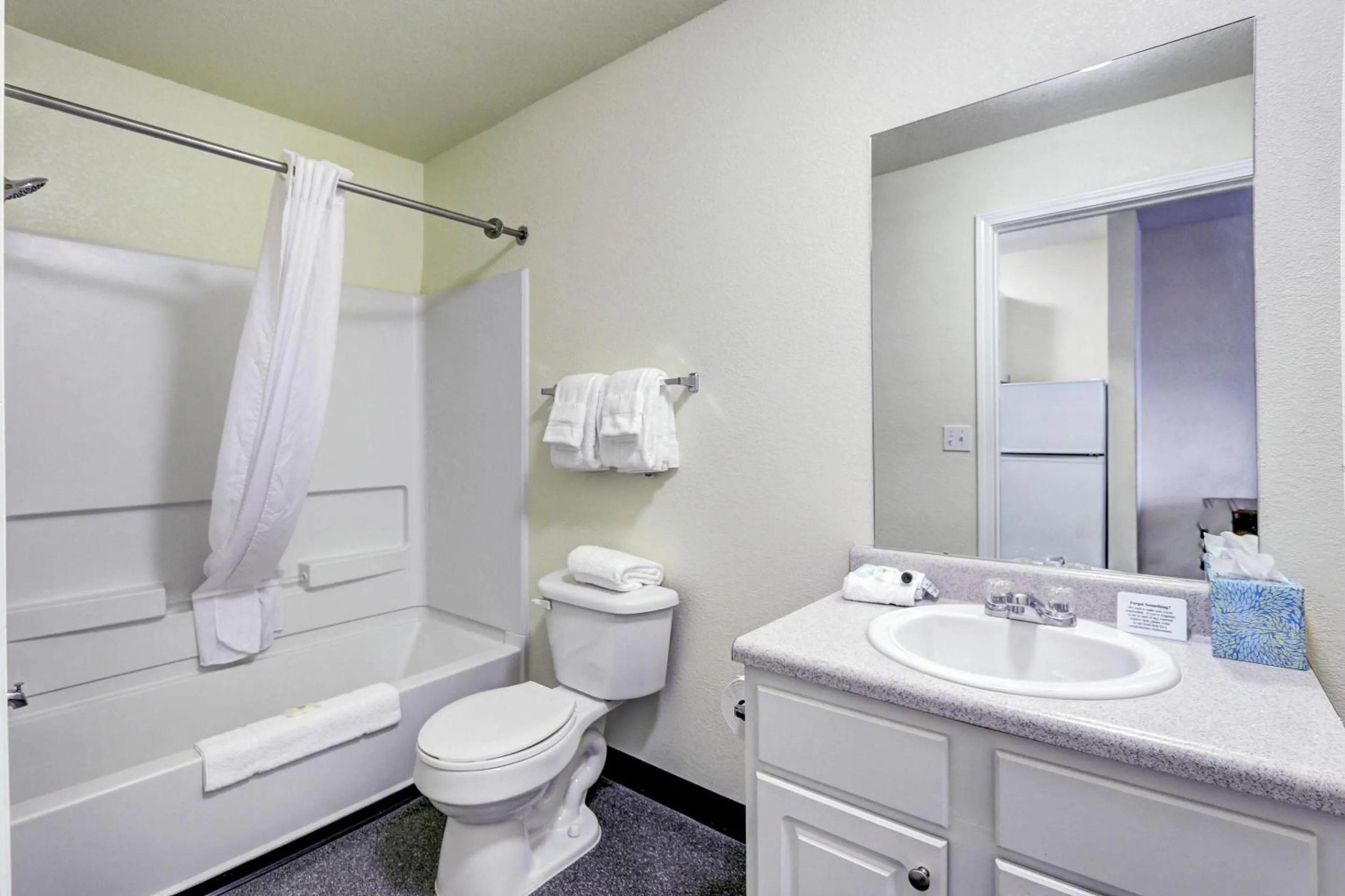 Bedroom in Suburban Studios Westminster Denver North