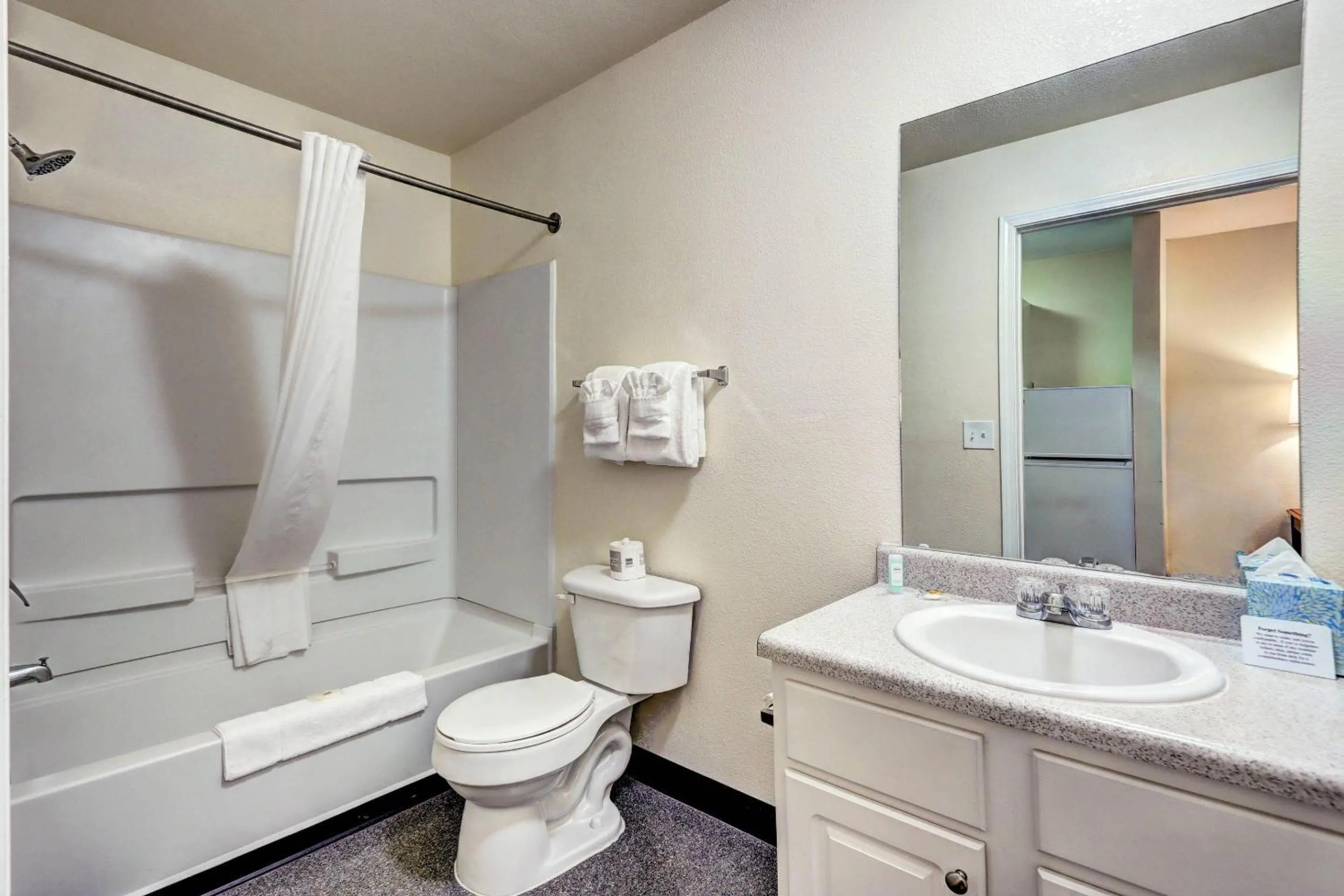 Bedroom in Suburban Studios Westminster Denver North