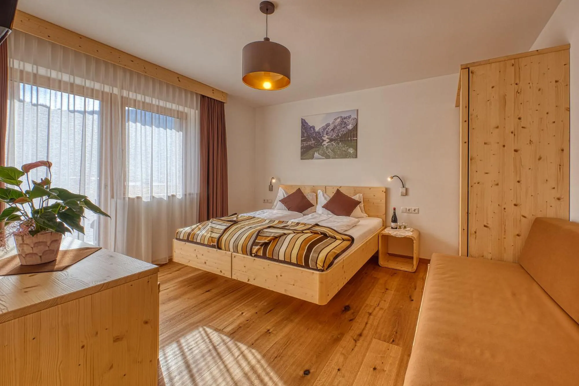 Bed in Garni Appartments Helvetia