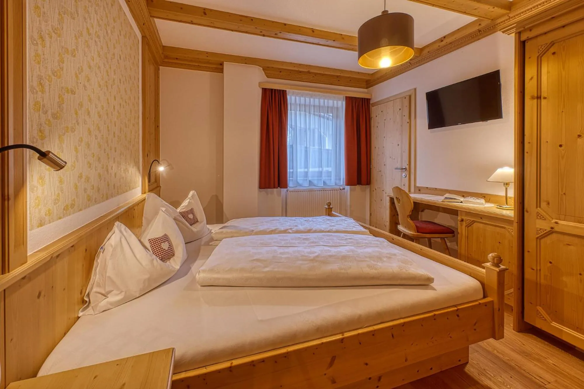 Photo of the whole room, Bed in Garni Appartments Helvetia