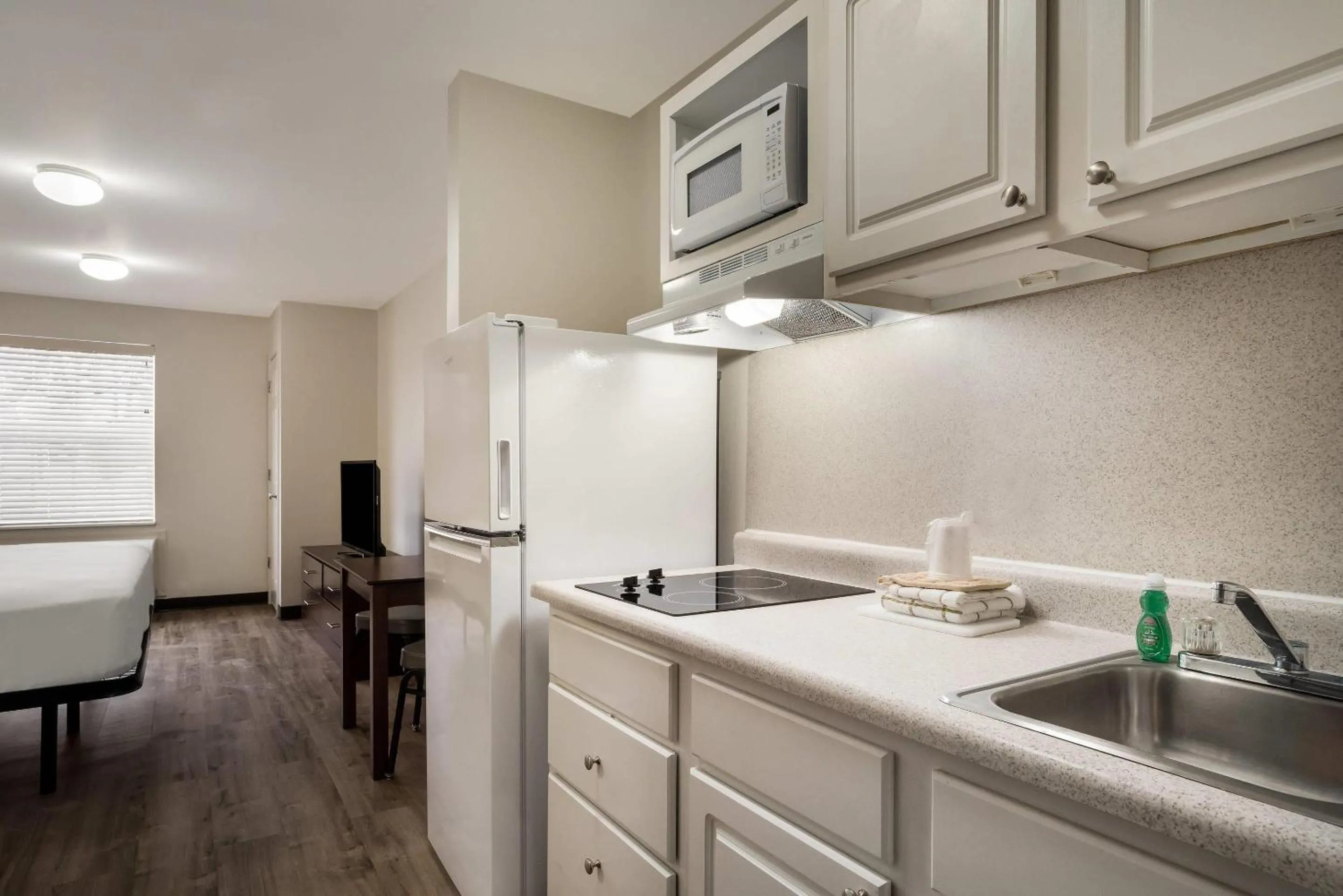 Bedroom in Suburban Studios Denver Central-Arvada