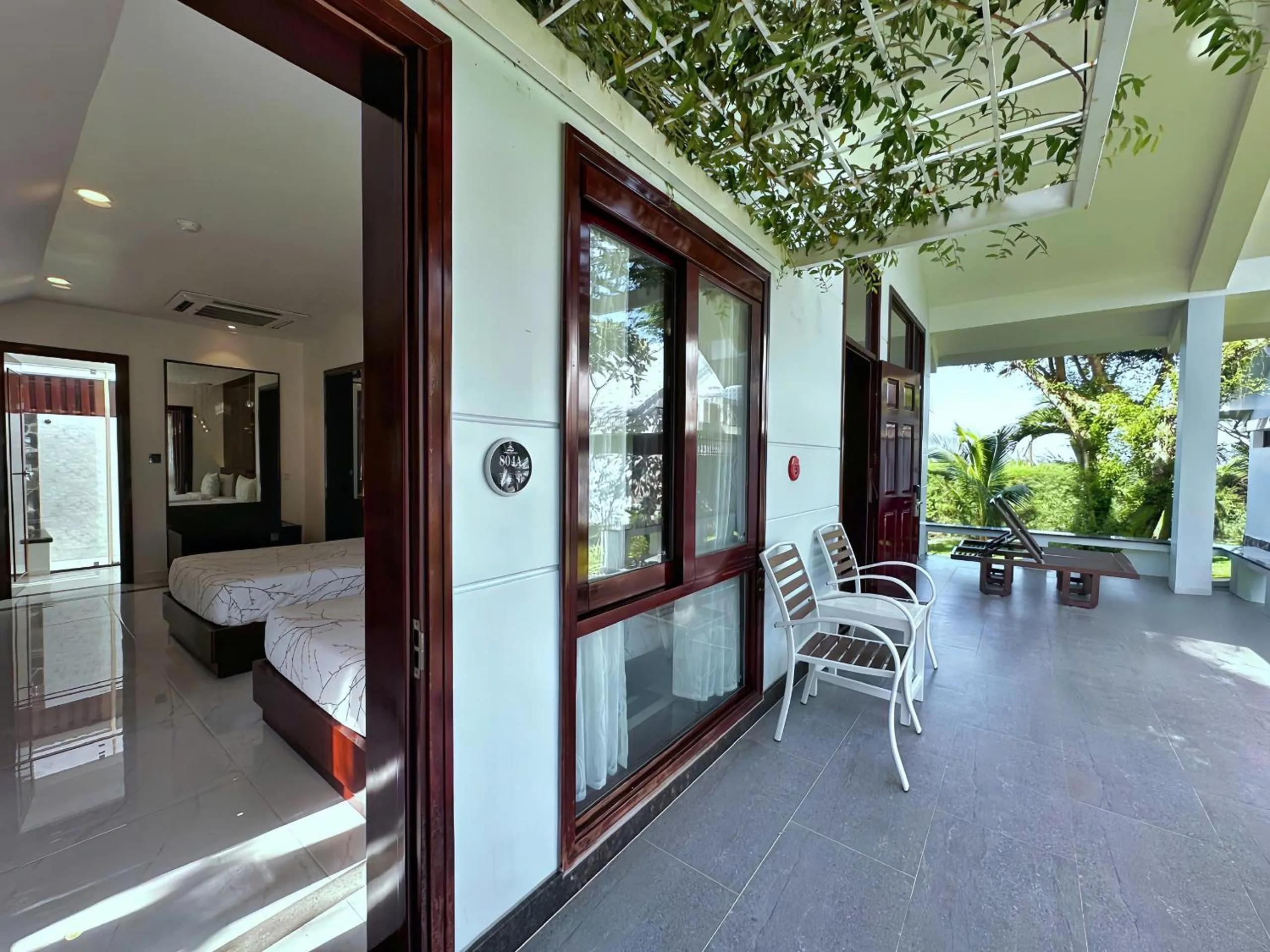 Balcony/Terrace, Bed in Carmelina Beach Resort Ho Tram