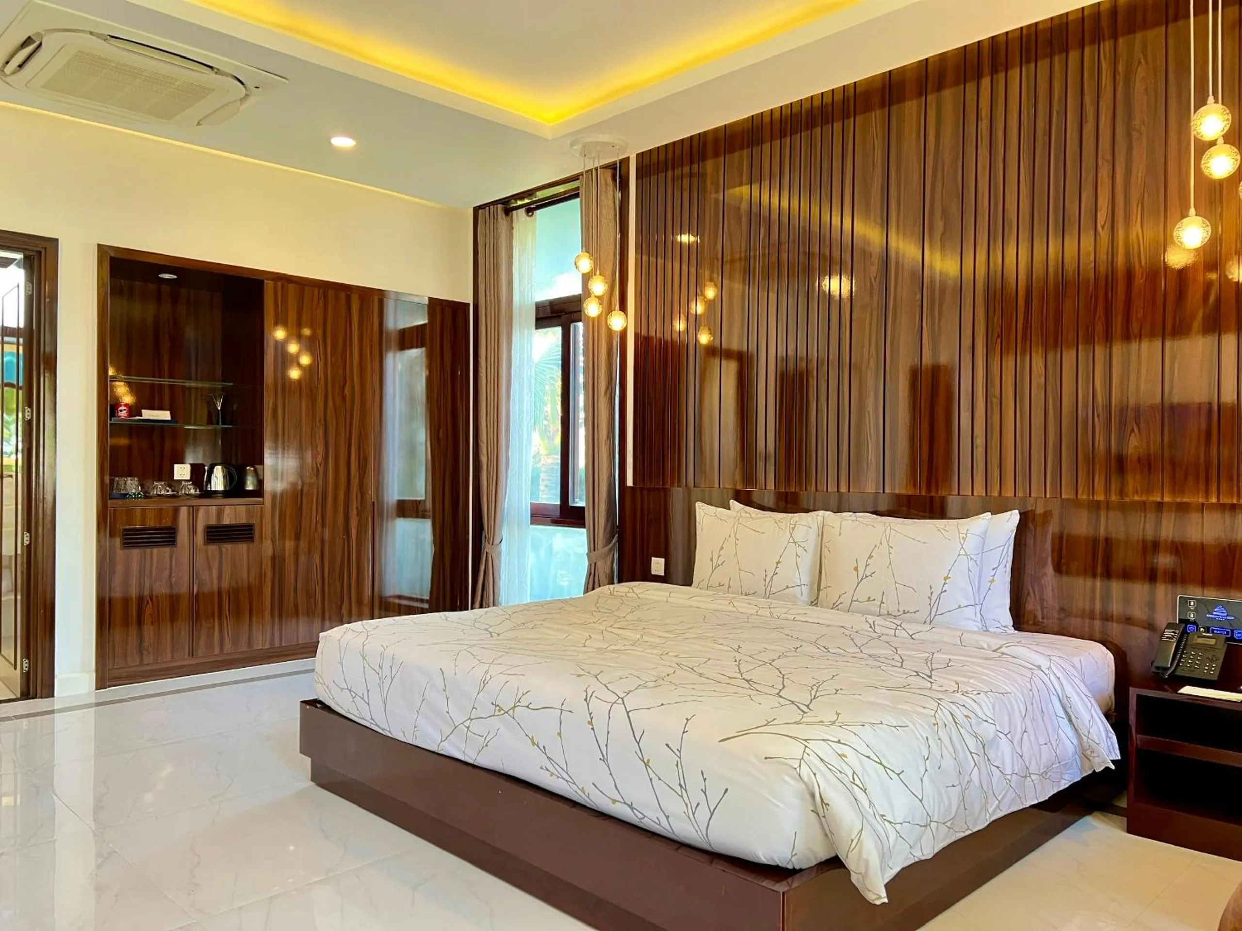 Bedroom, Bed in Carmelina Beach Resort Ho Tram