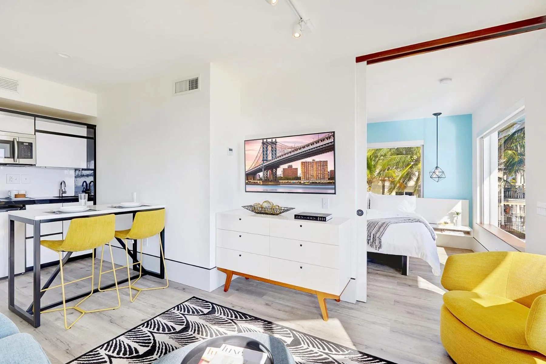 Living room, Bed in Ocean Treasure Beachside Suites
