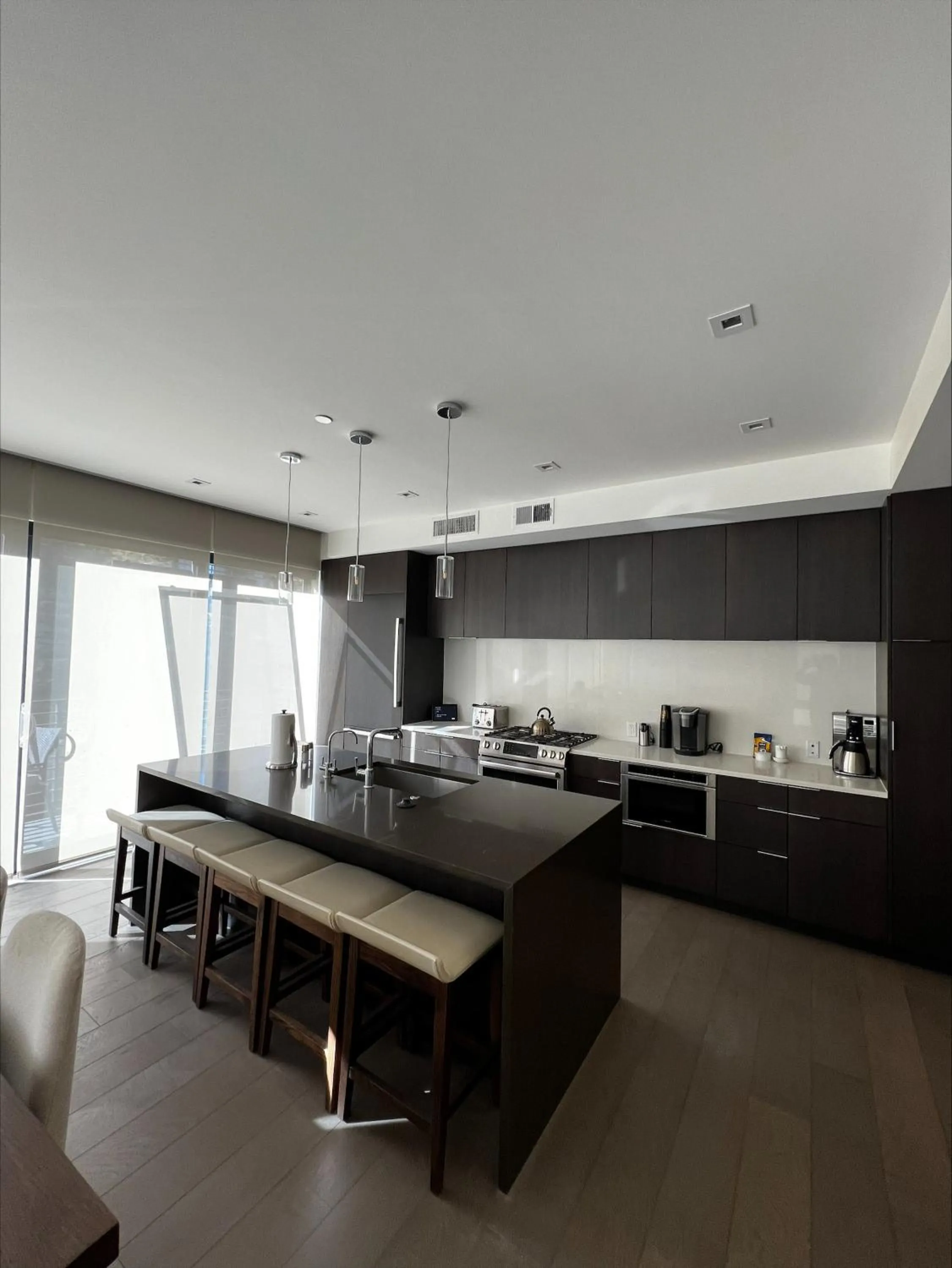 Communal kitchen in Lift Park City Condominiums by Vail Resorts