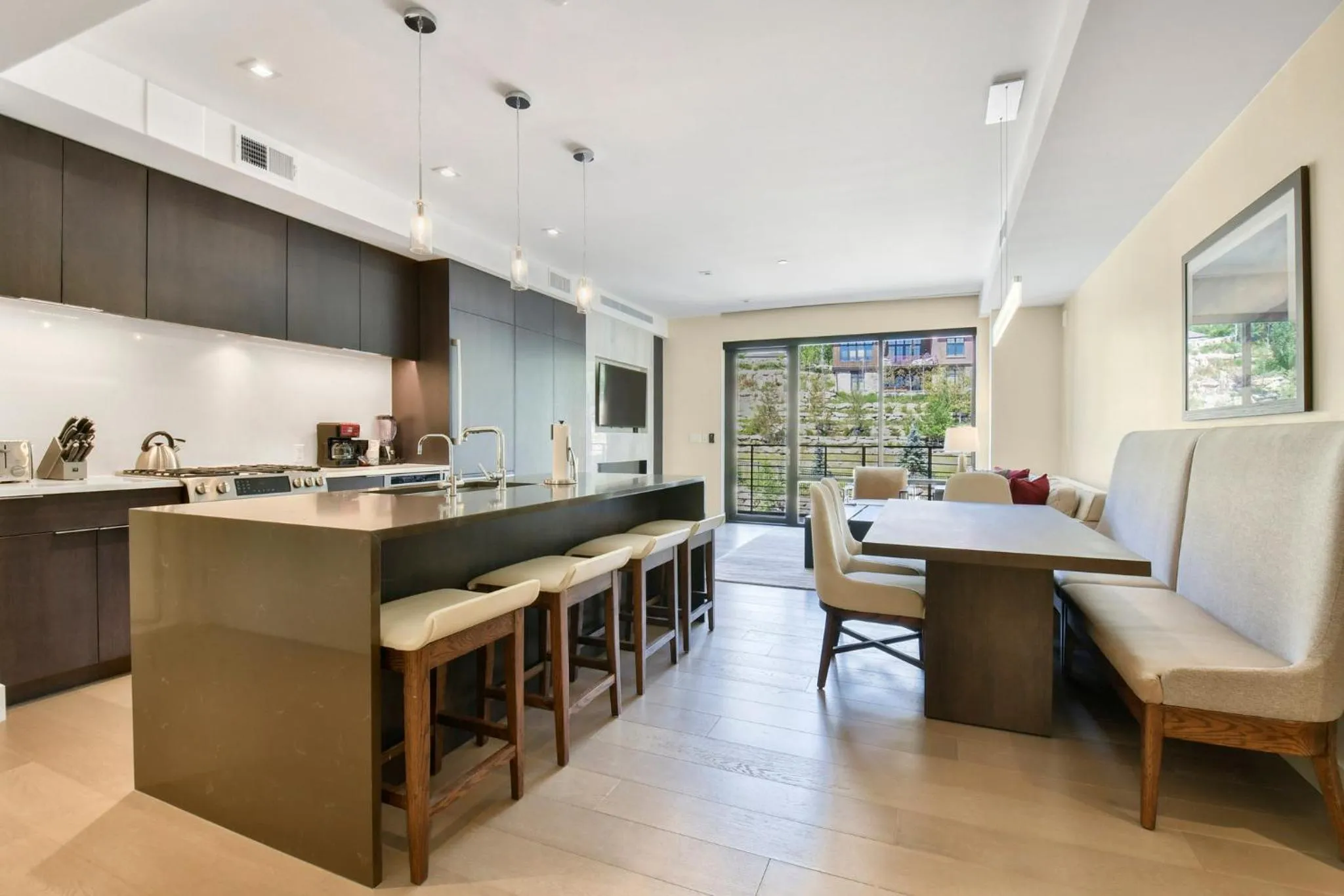 Communal kitchen in Lift Park City Condominiums by Vail Resorts