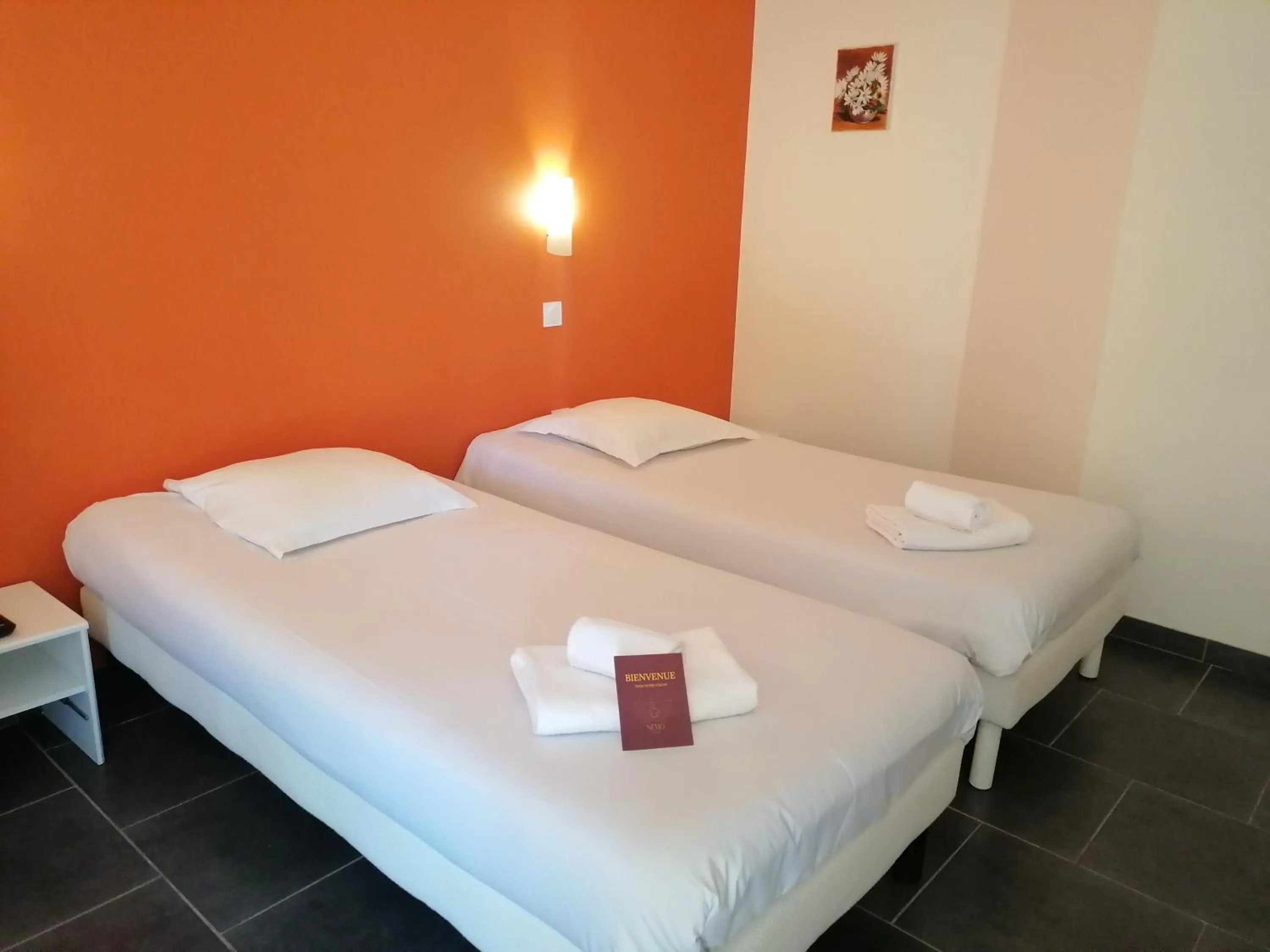 Bed in Hôtel Némo Aéroport de Pau