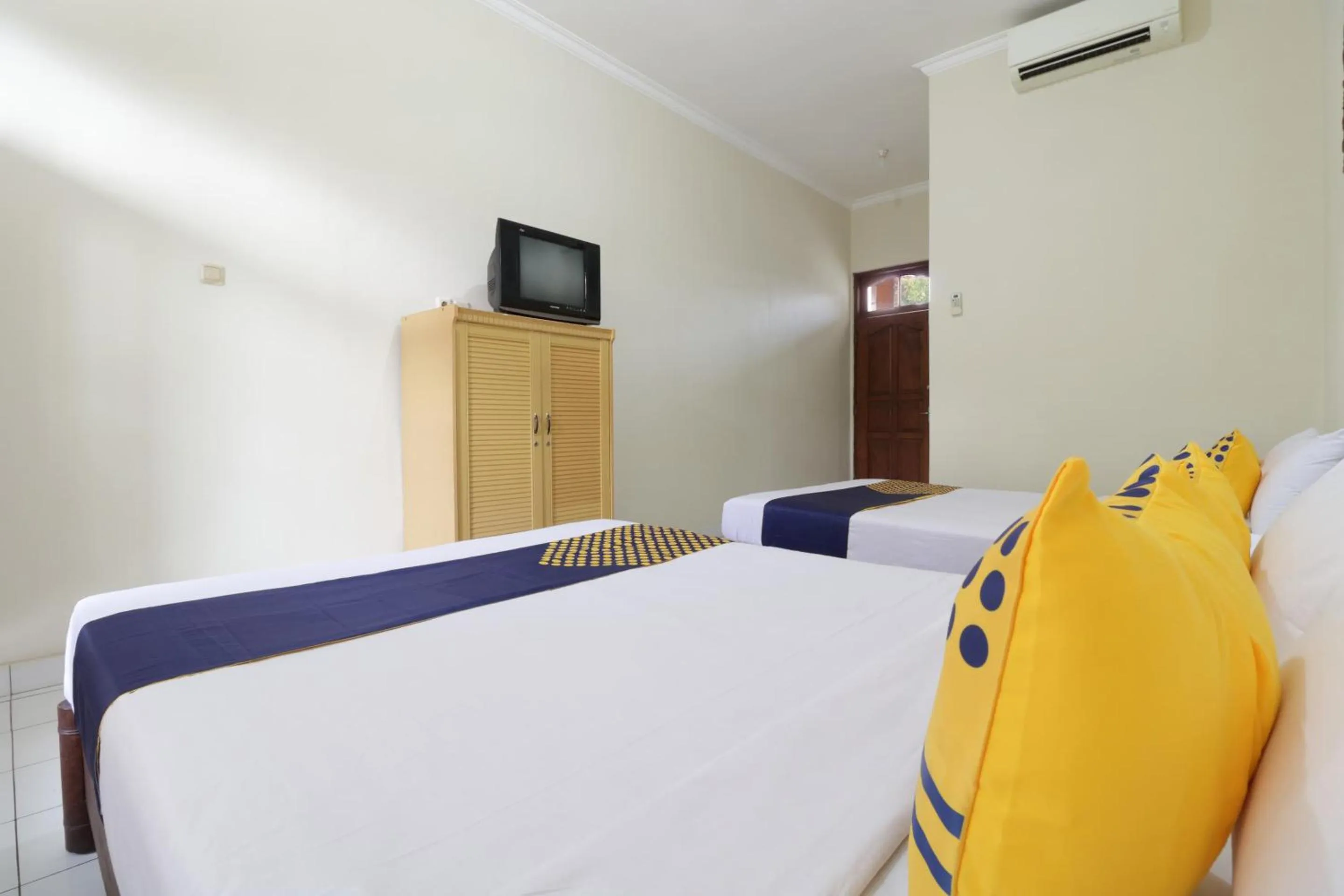 Bedroom in SPOT ON 2426 Hotel Aget Jaya Ii